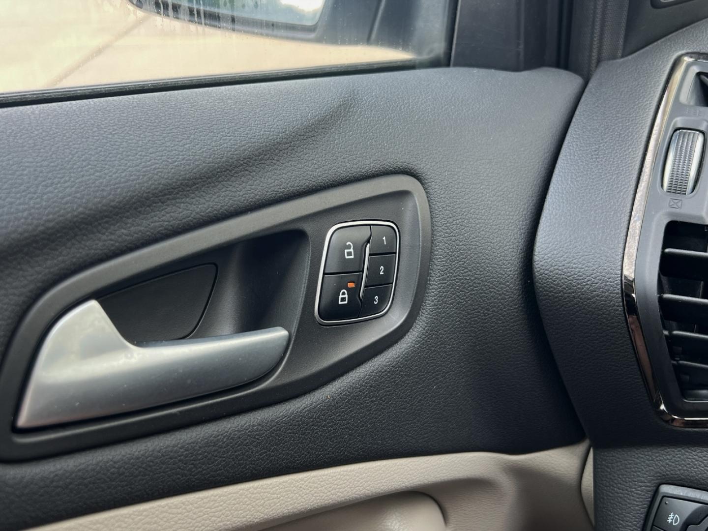 2017 GOLD /Tan Leather Ford Escape Titanium FWD (1FMCU0JD2HU) with an 1.5L 4 Cyl. engine, Automatic transmission, located at 2990 Old Orchard Rd., Jackson, MO, 63755, 37.354214, -89.612106 - 2017 Ford Escape Titanium 86xxx miles Front Wheel Drive 1.5L 4 Cyl. Automatic Leather Power/Heated Seats Backup Camera Bluetooth Remote Start Cruise Power Windows/Locks/Mirrors We have financing available and we accept trades! Fill out a credit application on our website or come by today - Photo#31