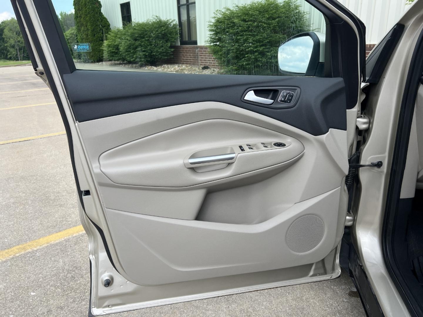 2017 GOLD /Tan Leather Ford Escape Titanium FWD (1FMCU0JD2HU) with an 1.5L 4 Cyl. engine, Automatic transmission, located at 2990 Old Orchard Rd., Jackson, MO, 63755, 37.354214, -89.612106 - 2017 Ford Escape Titanium 86xxx miles Front Wheel Drive 1.5L 4 Cyl. Automatic Leather Power/Heated Seats Backup Camera Bluetooth Remote Start Cruise Power Windows/Locks/Mirrors We have financing available and we accept trades! Fill out a credit application on our website or come by today - Photo#13