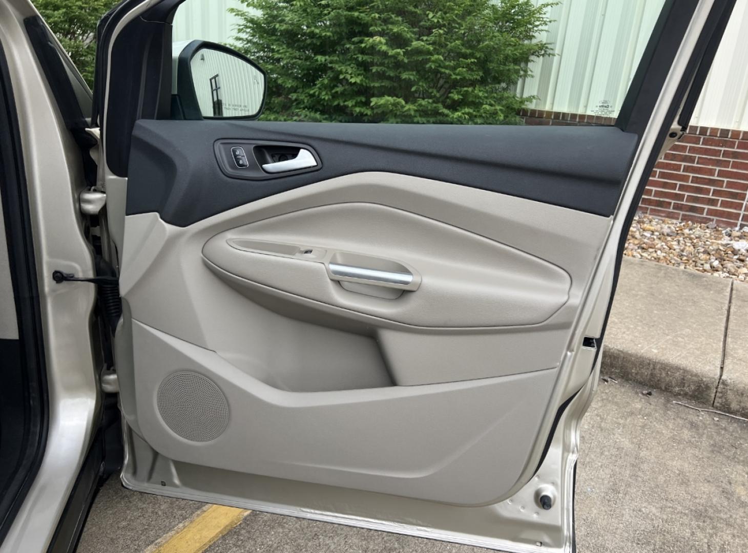 2017 GOLD /Tan Leather Ford Escape Titanium FWD (1FMCU0JD2HU) with an 1.5L 4 Cyl. engine, Automatic transmission, located at 2990 Old Orchard Rd., Jackson, MO, 63755, 37.354214, -89.612106 - 2017 Ford Escape Titanium 86xxx miles Front Wheel Drive 1.5L 4 Cyl. Automatic Leather Power/Heated Seats Backup Camera Bluetooth Remote Start Cruise Power Windows/Locks/Mirrors We have financing available and we accept trades! Fill out a credit application on our website or come by today - Photo#15