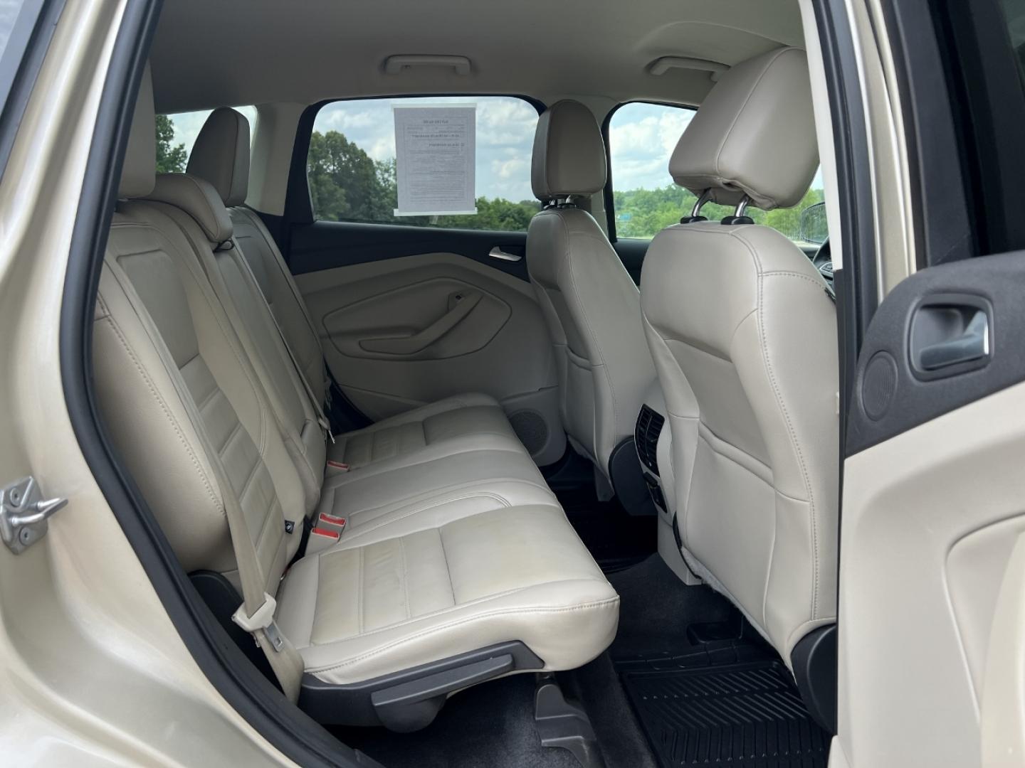 2017 GOLD /Tan Leather Ford Escape Titanium FWD (1FMCU0JD2HU) with an 1.5L 4 Cyl. engine, Automatic transmission, located at 2990 Old Orchard Rd., Jackson, MO, 63755, 37.354214, -89.612106 - 2017 Ford Escape Titanium 86xxx miles Front Wheel Drive 1.5L 4 Cyl. Automatic Leather Power/Heated Seats Backup Camera Bluetooth Remote Start Cruise Power Windows/Locks/Mirrors We have financing available and we accept trades! Fill out a credit application on our website or come by today - Photo#18