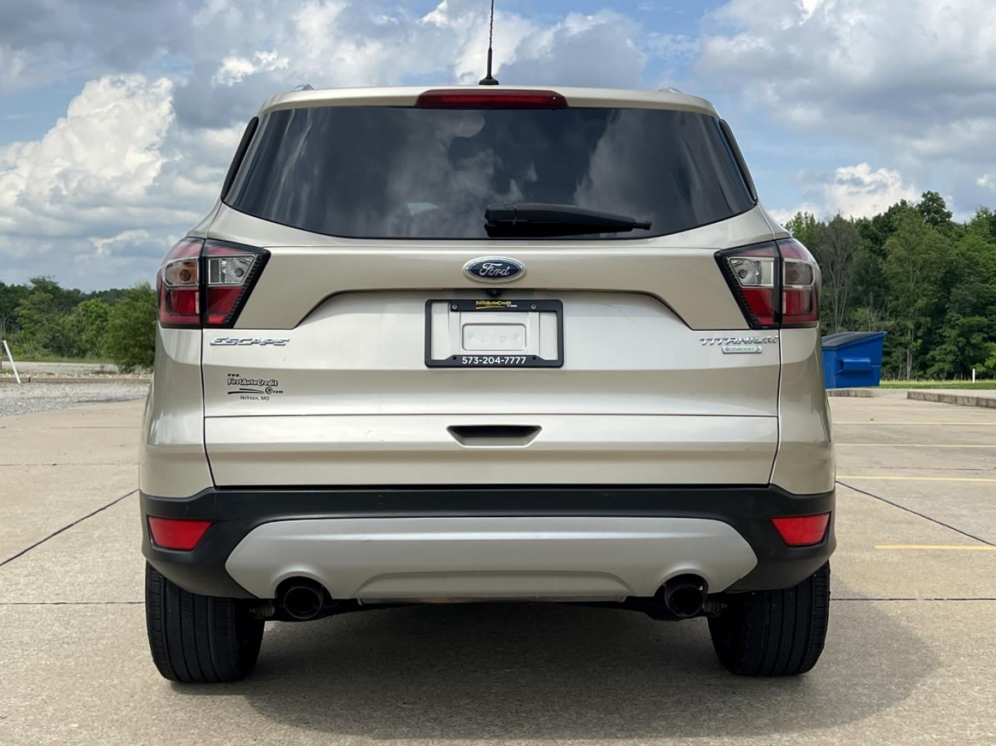 2017 GOLD /Tan Leather Ford Escape Titanium FWD (1FMCU0JD2HU) with an 1.5L 4 Cyl. engine, Automatic transmission, located at 2990 Old Orchard Rd., Jackson, MO, 63755, 37.354214, -89.612106 - 2017 Ford Escape Titanium 86xxx miles Front Wheel Drive 1.5L 4 Cyl. Automatic Leather Power/Heated Seats Backup Camera Bluetooth Remote Start Cruise Power Windows/Locks/Mirrors We have financing available and we accept trades! Fill out a credit application on our website or come by today - Photo#11