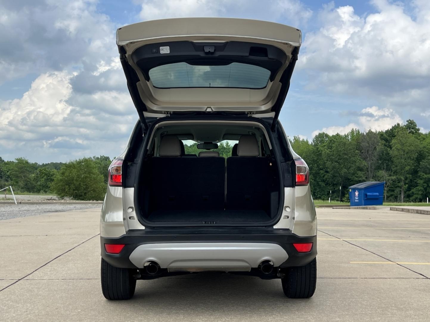 2017 GOLD /Tan Leather Ford Escape Titanium FWD (1FMCU0JD2HU) with an 1.5L 4 Cyl. engine, Automatic transmission, located at 2990 Old Orchard Rd., Jackson, MO, 63755, 37.354214, -89.612106 - 2017 Ford Escape Titanium 86xxx miles Front Wheel Drive 1.5L 4 Cyl. Automatic Leather Power/Heated Seats Backup Camera Bluetooth Remote Start Cruise Power Windows/Locks/Mirrors We have financing available and we accept trades! Fill out a credit application on our website or come by today - Photo#19