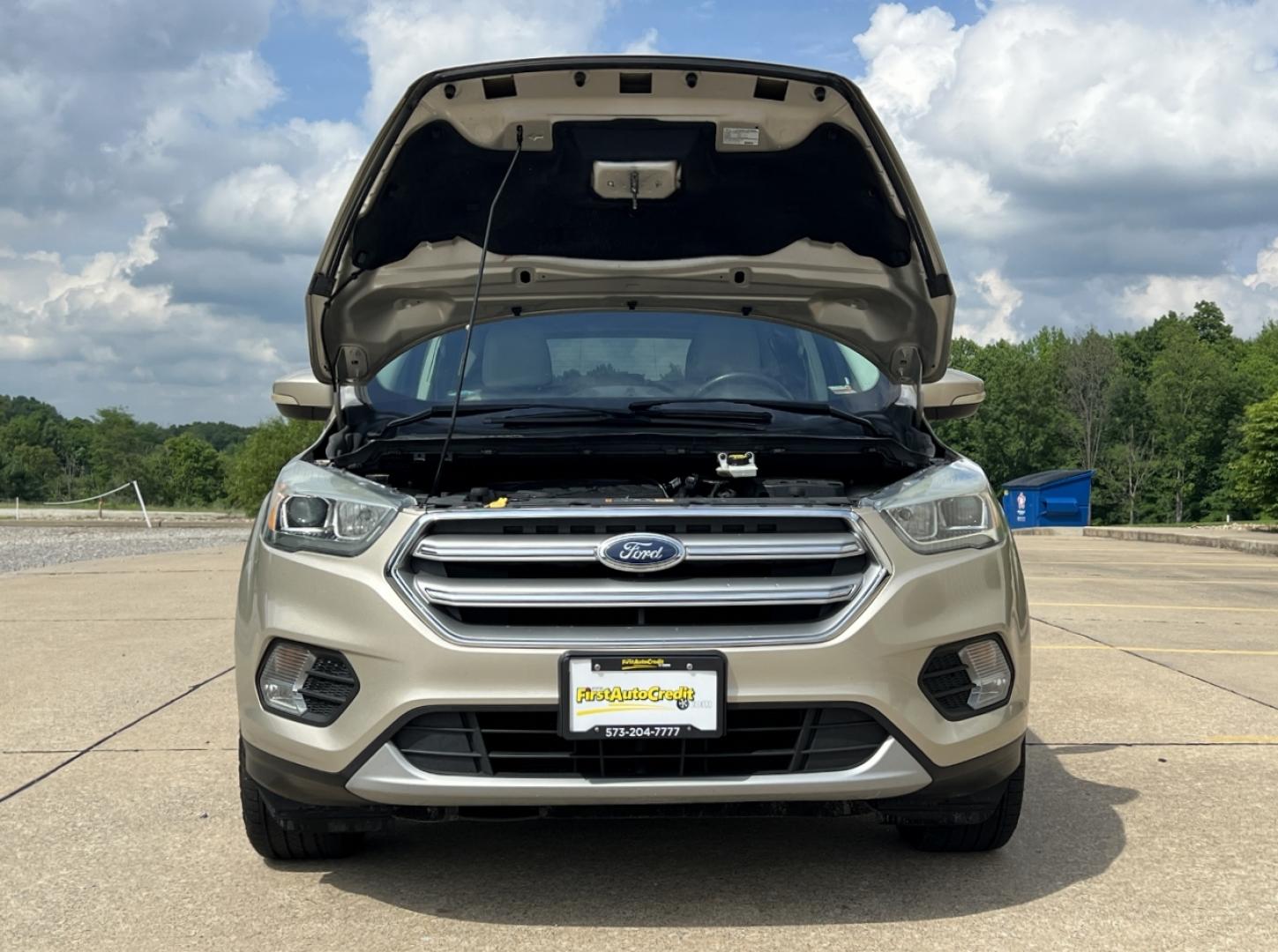 2017 GOLD /Tan Leather Ford Escape Titanium FWD (1FMCU0JD2HU) with an 1.5L 4 Cyl. engine, Automatic transmission, located at 2990 Old Orchard Rd., Jackson, MO, 63755, 37.354214, -89.612106 - 2017 Ford Escape Titanium 86xxx miles Front Wheel Drive 1.5L 4 Cyl. Automatic Leather Power/Heated Seats Backup Camera Bluetooth Remote Start Cruise Power Windows/Locks/Mirrors We have financing available and we accept trades! Fill out a credit application on our website or come by today - Photo#36