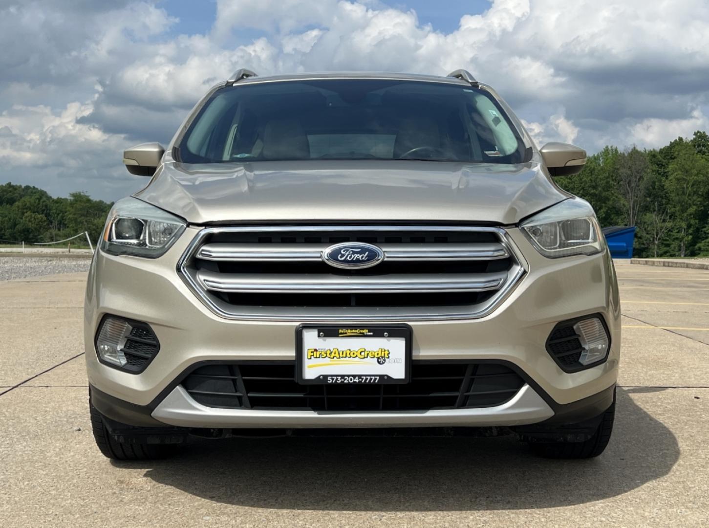 2017 GOLD /Tan Leather Ford Escape Titanium FWD (1FMCU0JD2HU) with an 1.5L 4 Cyl. engine, Automatic transmission, located at 2990 Old Orchard Rd., Jackson, MO, 63755, 37.354214, -89.612106 - 2017 Ford Escape Titanium 86xxx miles Front Wheel Drive 1.5L 4 Cyl. Automatic Leather Power/Heated Seats Backup Camera Bluetooth Remote Start Cruise Power Windows/Locks/Mirrors We have financing available and we accept trades! Fill out a credit application on our website or come by today - Photo#12
