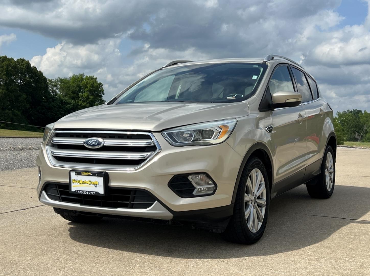 2017 GOLD /Tan Leather Ford Escape Titanium FWD (1FMCU0JD2HU) with an 1.5L 4 Cyl. engine, Automatic transmission, located at 2990 Old Orchard Rd., Jackson, MO, 63755, 37.354214, -89.612106 - 2017 Ford Escape Titanium 86xxx miles Front Wheel Drive 1.5L 4 Cyl. Automatic Leather Power/Heated Seats Backup Camera Bluetooth Remote Start Cruise Power Windows/Locks/Mirrors We have financing available and we accept trades! Fill out a credit application on our website or come by today - Photo#6