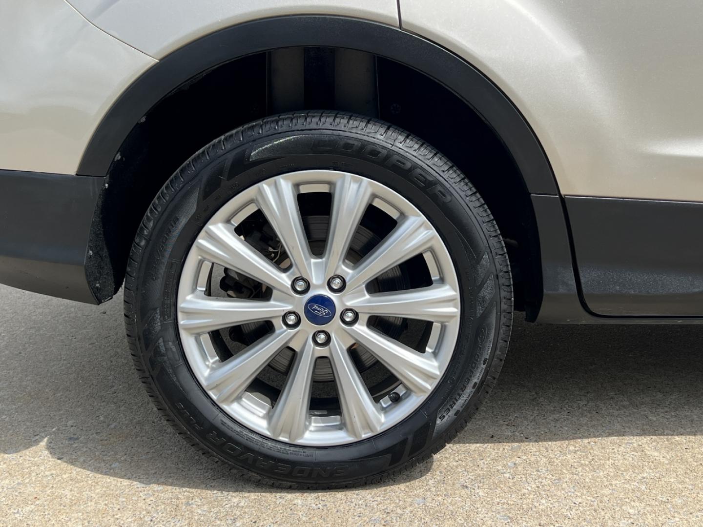 2017 GOLD /Tan Leather Ford Escape Titanium FWD (1FMCU0JD2HU) with an 1.5L 4 Cyl. engine, Automatic transmission, located at 2990 Old Orchard Rd., Jackson, MO, 63755, 37.354214, -89.612106 - 2017 Ford Escape Titanium 86xxx miles Front Wheel Drive 1.5L 4 Cyl. Automatic Leather Power/Heated Seats Backup Camera Bluetooth Remote Start Cruise Power Windows/Locks/Mirrors We have financing available and we accept trades! Fill out a credit application on our website or come by today - Photo#41