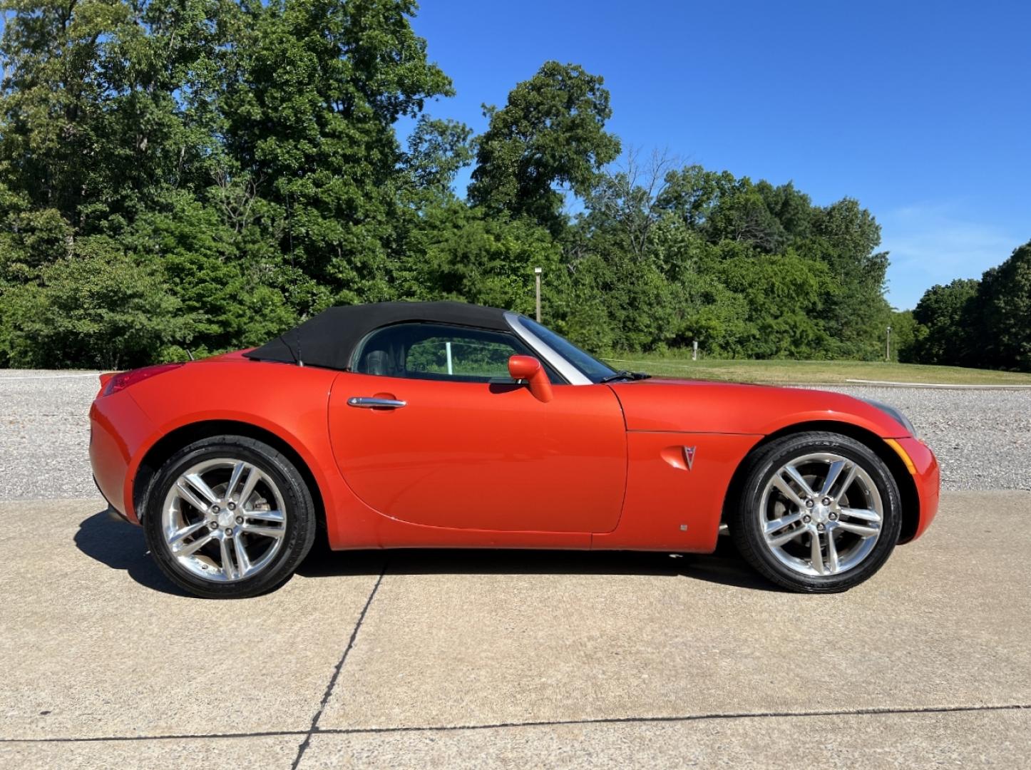 2009 ORANGE /Black Leather Pontiac Solstice Street Edition (1G2MK35B19Y) with an 2.4L 4 Cyl. engine, Automatic transmission, located at 2990 Old Orchard Rd., Jackson, MO, 63755, 37.354214, -89.612106 - 2009 Pontiac Solstice Street Edition Local 1-Owner Only 54xxx miles Rear Wheel Drive 2.4L 4 Cyl. 5-Speed Manual Leather Cruise Power Windows/Locks/Mirrors We have financing available and we accept trades! Fill out a credit application on our website or come by today! If you have any questi - Photo#4