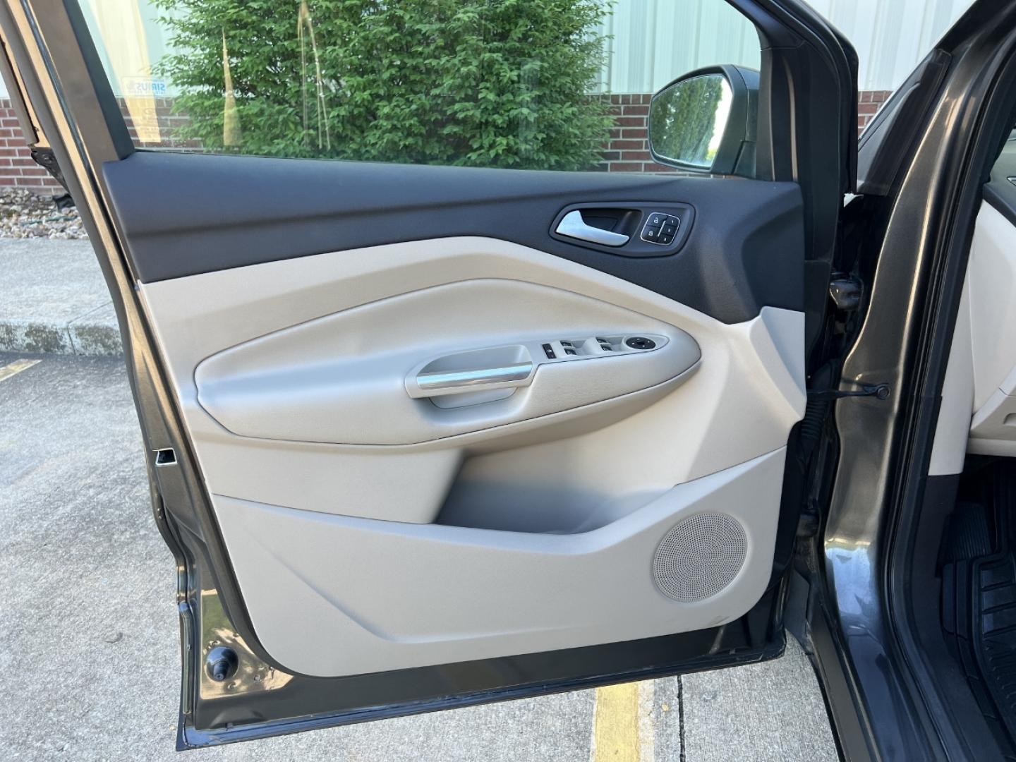 2017 GRAY /Tan Leather Ford Escape Titanium FWD (1FMCU0JD4HU) with an 1.5L 4 Cyl. engine, Automatic transmission, located at 2990 Old Orchard Rd., Jackson, MO, 63755, 37.354214, -89.612106 - 2017 Ford Escape Titanium Only 39xxx miles Front Wheel Drive 1.5L 4 Cyl. Automatic Leather Navigation Power/Heated Seats Heated Steering Wheel Backup Camera Sunroof Bluetooth Remote Start Cruise Power Windows/Locks/Mirrors We have financing available and we accept trades! Fill out a c - Photo#15