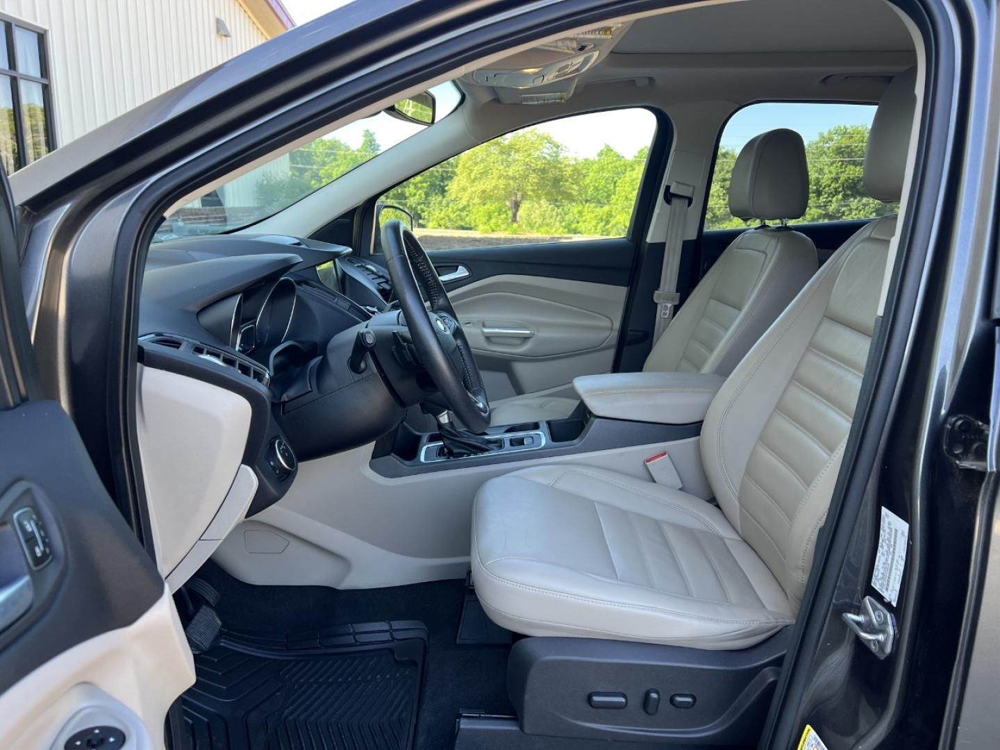 2017 GRAY /Tan Leather Ford Escape Titanium FWD (1FMCU0JD4HU) with an 1.5L 4 Cyl. engine, Automatic transmission, located at 2990 Old Orchard Rd., Jackson, MO, 63755, 37.354214, -89.612106 - 2017 Ford Escape Titanium Only 39xxx miles Front Wheel Drive 1.5L 4 Cyl. Automatic Leather Navigation Power/Heated Seats Heated Steering Wheel Backup Camera Sunroof Bluetooth Remote Start Cruise Power Windows/Locks/Mirrors We have financing available and we accept trades! Fill out a c - Photo#16