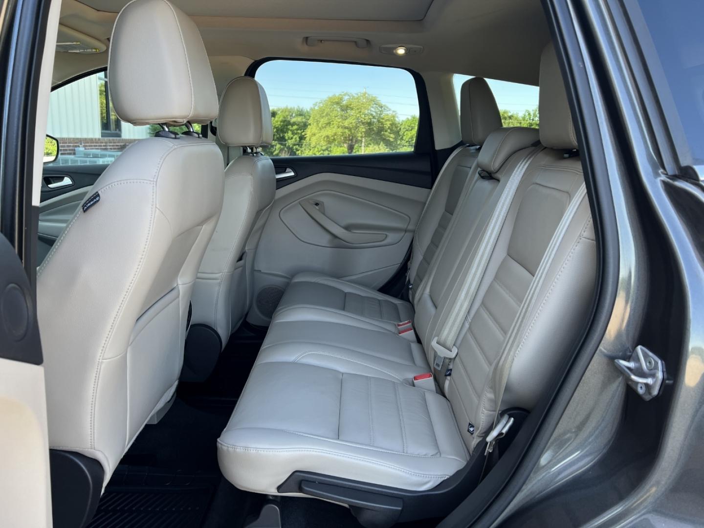 2017 GRAY /Tan Leather Ford Escape Titanium FWD (1FMCU0JD4HU) with an 1.5L 4 Cyl. engine, Automatic transmission, located at 2990 Old Orchard Rd., Jackson, MO, 63755, 37.354214, -89.612106 - 2017 Ford Escape Titanium Only 39xxx miles Front Wheel Drive 1.5L 4 Cyl. Automatic Leather Navigation Power/Heated Seats Heated Steering Wheel Backup Camera Sunroof Bluetooth Remote Start Cruise Power Windows/Locks/Mirrors We have financing available and we accept trades! Fill out a c - Photo#19