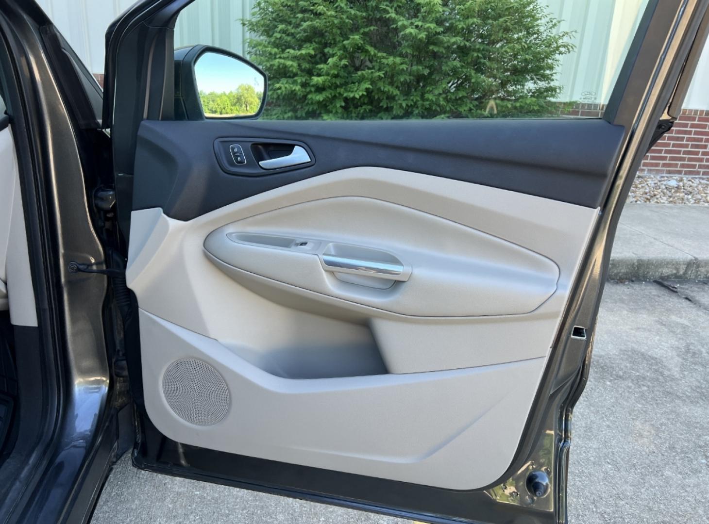 2017 GRAY /Tan Leather Ford Escape Titanium FWD (1FMCU0JD4HU) with an 1.5L 4 Cyl. engine, Automatic transmission, located at 2990 Old Orchard Rd., Jackson, MO, 63755, 37.354214, -89.612106 - 2017 Ford Escape Titanium Only 39xxx miles Front Wheel Drive 1.5L 4 Cyl. Automatic Leather Navigation Power/Heated Seats Heated Steering Wheel Backup Camera Sunroof Bluetooth Remote Start Cruise Power Windows/Locks/Mirrors We have financing available and we accept trades! Fill out a c - Photo#17