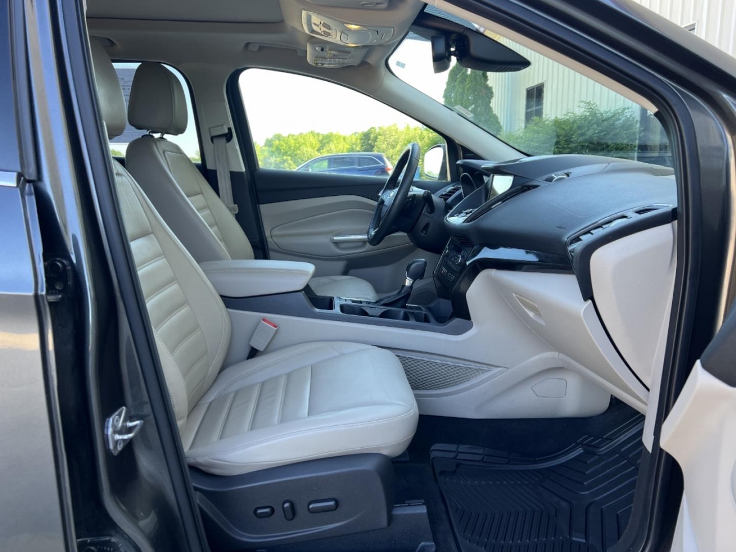 2017 GRAY /Tan Leather Ford Escape Titanium FWD (1FMCU0JD4HU) with an 1.5L 4 Cyl. engine, Automatic transmission, located at 2990 Old Orchard Rd., Jackson, MO, 63755, 37.354214, -89.612106 - 2017 Ford Escape Titanium Only 39xxx miles Front Wheel Drive 1.5L 4 Cyl. Automatic Leather Navigation Power/Heated Seats Heated Steering Wheel Backup Camera Sunroof Bluetooth Remote Start Cruise Power Windows/Locks/Mirrors We have financing available and we accept trades! Fill out a c - Photo#18