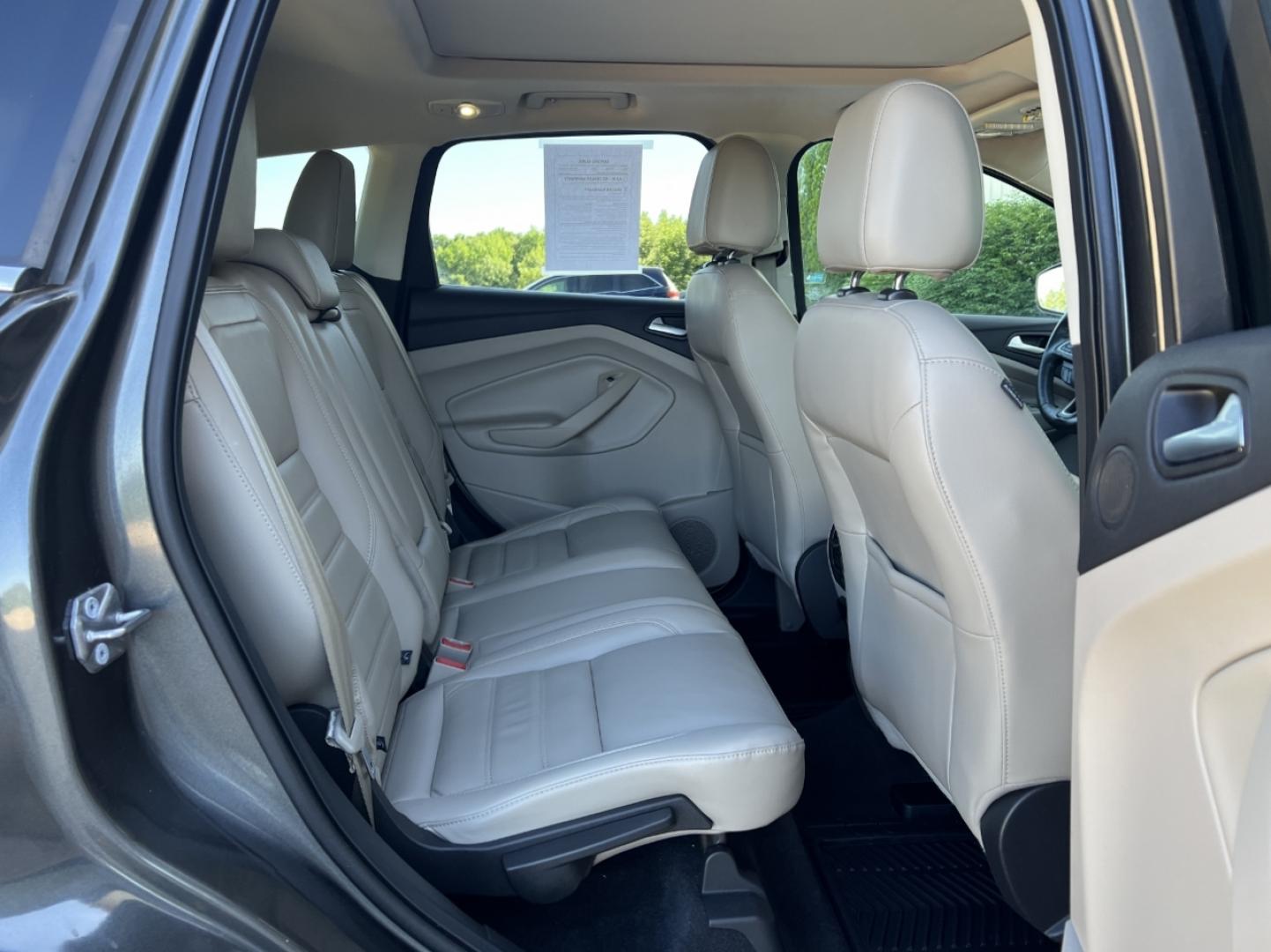 2017 GRAY /Tan Leather Ford Escape Titanium FWD (1FMCU0JD4HU) with an 1.5L 4 Cyl. engine, Automatic transmission, located at 2990 Old Orchard Rd., Jackson, MO, 63755, 37.354214, -89.612106 - 2017 Ford Escape Titanium Only 39xxx miles Front Wheel Drive 1.5L 4 Cyl. Automatic Leather Navigation Power/Heated Seats Heated Steering Wheel Backup Camera Sunroof Bluetooth Remote Start Cruise Power Windows/Locks/Mirrors We have financing available and we accept trades! Fill out a c - Photo#20