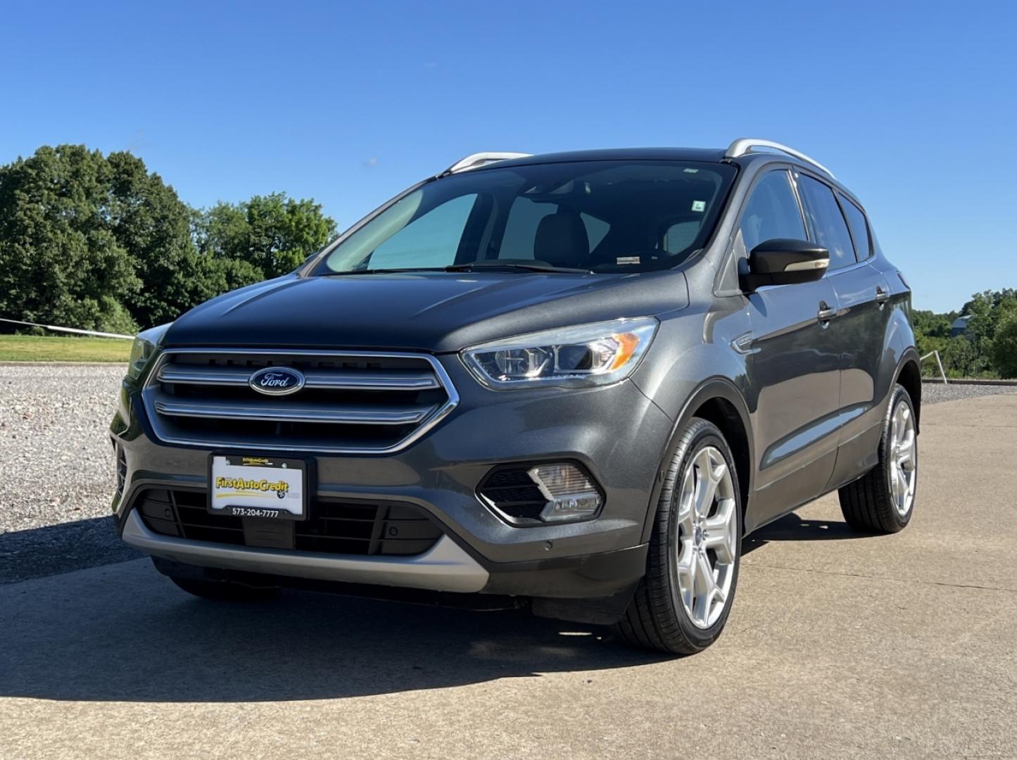 2017 GRAY /Tan Leather Ford Escape Titanium FWD (1FMCU0JD4HU) with an 1.5L 4 Cyl. engine, Automatic transmission, located at 2990 Old Orchard Rd., Jackson, MO, 63755, 37.354214, -89.612106 - 2017 Ford Escape Titanium Only 39xxx miles Front Wheel Drive 1.5L 4 Cyl. Automatic Leather Navigation Power/Heated Seats Heated Steering Wheel Backup Camera Sunroof Bluetooth Remote Start Cruise Power Windows/Locks/Mirrors We have financing available and we accept trades! Fill out a c - Photo#8