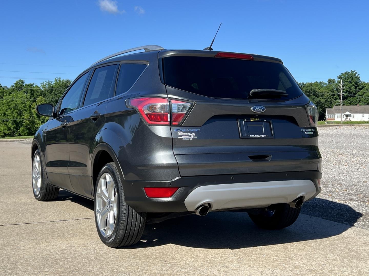 2017 GRAY /Tan Leather Ford Escape Titanium FWD (1FMCU0JD4HU) with an 1.5L 4 Cyl. engine, Automatic transmission, located at 2990 Old Orchard Rd., Jackson, MO, 63755, 37.354214, -89.612106 - 2017 Ford Escape Titanium Only 39xxx miles Front Wheel Drive 1.5L 4 Cyl. Automatic Leather Navigation Power/Heated Seats Heated Steering Wheel Backup Camera Sunroof Bluetooth Remote Start Cruise Power Windows/Locks/Mirrors We have financing available and we accept trades! Fill out a c - Photo#12