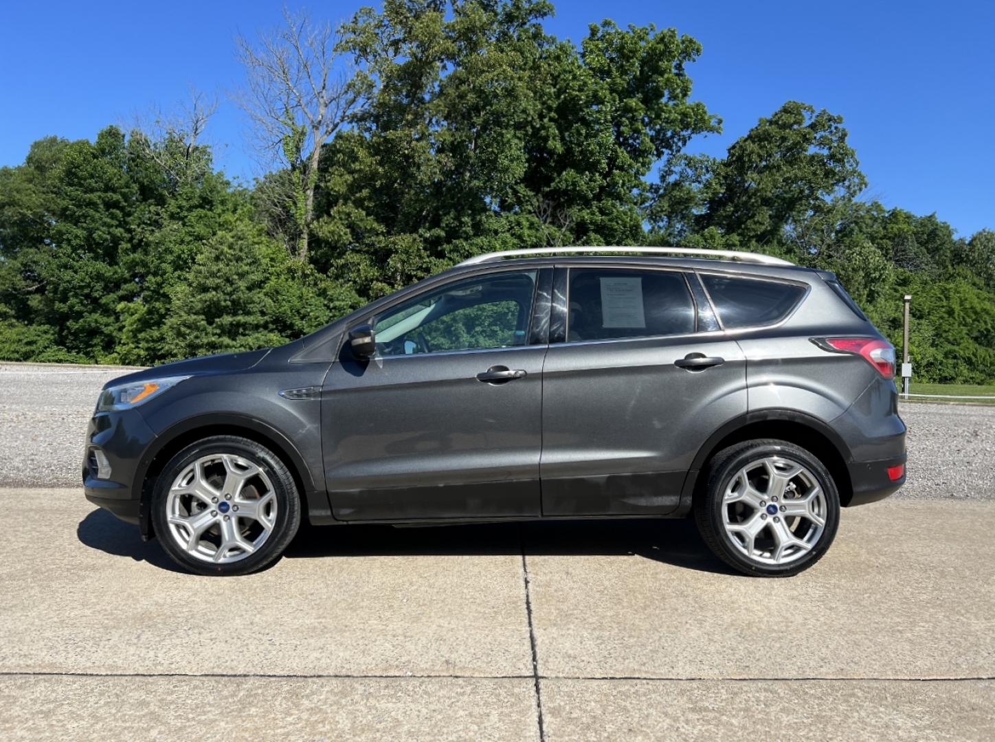2017 GRAY /Tan Leather Ford Escape Titanium FWD (1FMCU0JD4HU) with an 1.5L 4 Cyl. engine, Automatic transmission, located at 2990 Old Orchard Rd., Jackson, MO, 63755, 37.354214, -89.612106 - 2017 Ford Escape Titanium Only 39xxx miles Front Wheel Drive 1.5L 4 Cyl. Automatic Leather Navigation Power/Heated Seats Heated Steering Wheel Backup Camera Sunroof Bluetooth Remote Start Cruise Power Windows/Locks/Mirrors We have financing available and we accept trades! Fill out a c - Photo#9