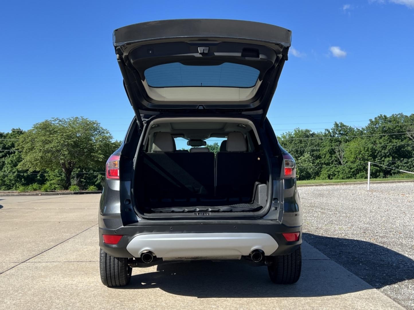 2017 GRAY /Tan Leather Ford Escape Titanium FWD (1FMCU0JD4HU) with an 1.5L 4 Cyl. engine, Automatic transmission, located at 2990 Old Orchard Rd., Jackson, MO, 63755, 37.354214, -89.612106 - 2017 Ford Escape Titanium Only 39xxx miles Front Wheel Drive 1.5L 4 Cyl. Automatic Leather Navigation Power/Heated Seats Heated Steering Wheel Backup Camera Sunroof Bluetooth Remote Start Cruise Power Windows/Locks/Mirrors We have financing available and we accept trades! Fill out a c - Photo#21