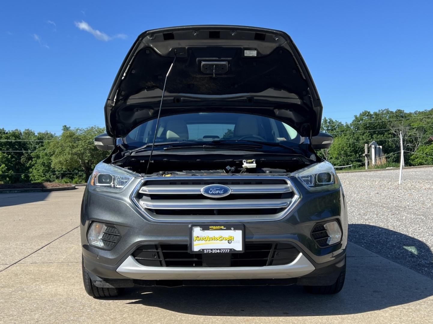 2017 GRAY /Tan Leather Ford Escape Titanium FWD (1FMCU0JD4HU) with an 1.5L 4 Cyl. engine, Automatic transmission, located at 2990 Old Orchard Rd., Jackson, MO, 63755, 37.354214, -89.612106 - 2017 Ford Escape Titanium Only 39xxx miles Front Wheel Drive 1.5L 4 Cyl. Automatic Leather Navigation Power/Heated Seats Heated Steering Wheel Backup Camera Sunroof Bluetooth Remote Start Cruise Power Windows/Locks/Mirrors We have financing available and we accept trades! Fill out a c - Photo#37