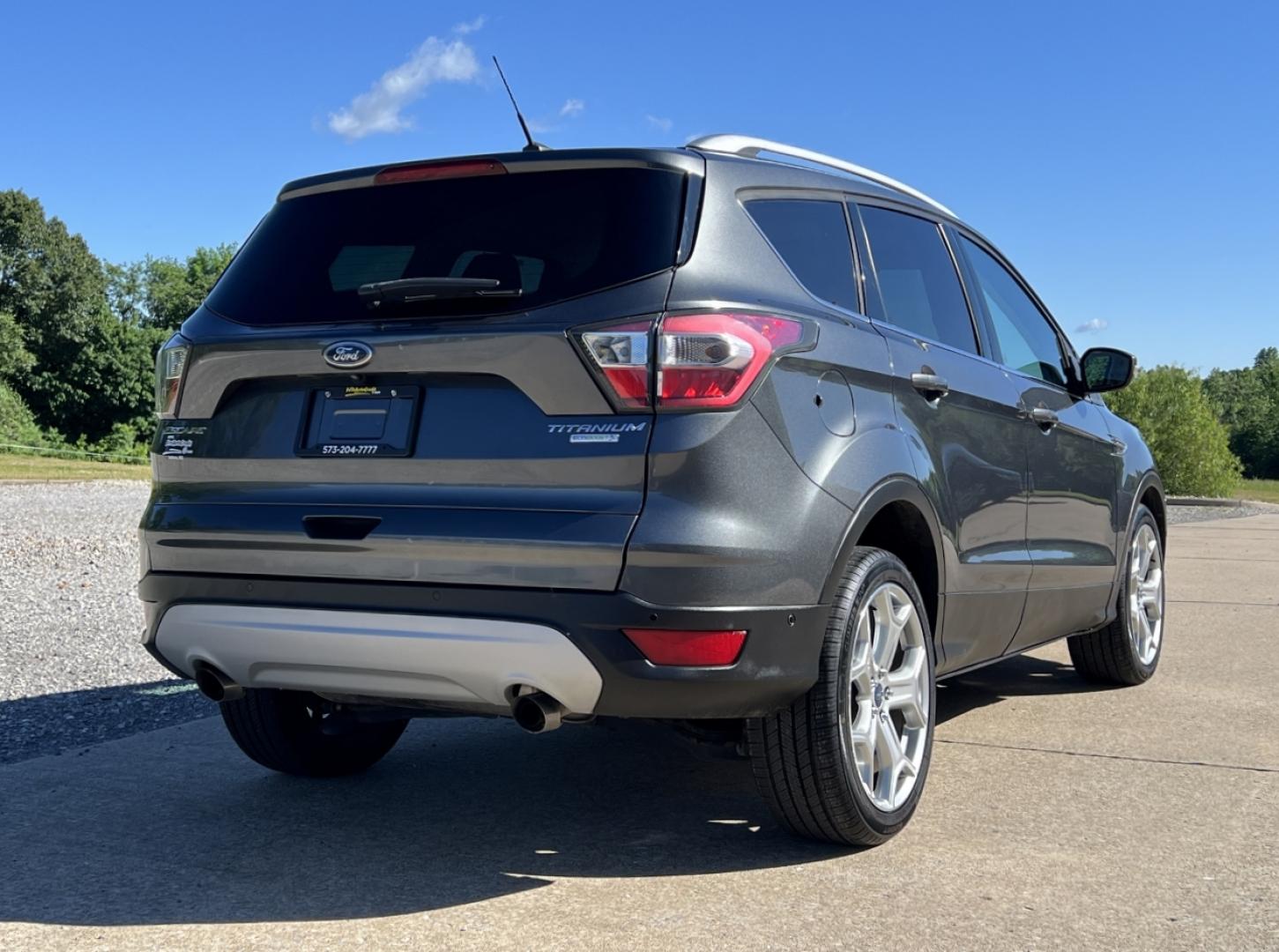 2017 GRAY /Tan Leather Ford Escape Titanium FWD (1FMCU0JD4HU) with an 1.5L 4 Cyl. engine, Automatic transmission, located at 2990 Old Orchard Rd., Jackson, MO, 63755, 37.354214, -89.612106 - 2017 Ford Escape Titanium Only 39xxx miles Front Wheel Drive 1.5L 4 Cyl. Automatic Leather Navigation Power/Heated Seats Heated Steering Wheel Backup Camera Sunroof Bluetooth Remote Start Cruise Power Windows/Locks/Mirrors We have financing available and we accept trades! Fill out a c - Photo#11