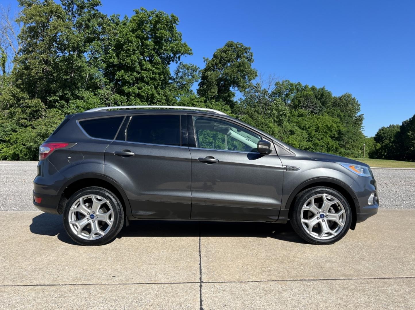 2017 GRAY /Tan Leather Ford Escape Titanium FWD (1FMCU0JD4HU) with an 1.5L 4 Cyl. engine, Automatic transmission, located at 2990 Old Orchard Rd., Jackson, MO, 63755, 37.354214, -89.612106 - 2017 Ford Escape Titanium Only 39xxx miles Front Wheel Drive 1.5L 4 Cyl. Automatic Leather Navigation Power/Heated Seats Heated Steering Wheel Backup Camera Sunroof Bluetooth Remote Start Cruise Power Windows/Locks/Mirrors We have financing available and we accept trades! Fill out a c - Photo#10