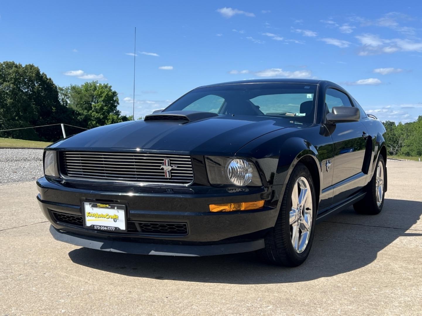 2009 BLACK /Black Cloth Ford Mustang V6 Coupe (1ZVHT80N695) with an 4.0L V6 engine, Automatic transmission, located at 2990 Old Orchard Rd., Jackson, MO, 63755, 37.354214, -89.612106 - 2009 Ford Mustang V6 Deluxe Local 1-Owner Only 65xxx miles Rear Wheel Drive 4.0L V6 Automatic Power Driver Seat Cruise Power Windows/Locks/Mirrors We have financing available and we accept trades! Fill out a credit application on our website or come by today! If you have any questions, giv - Photo#3