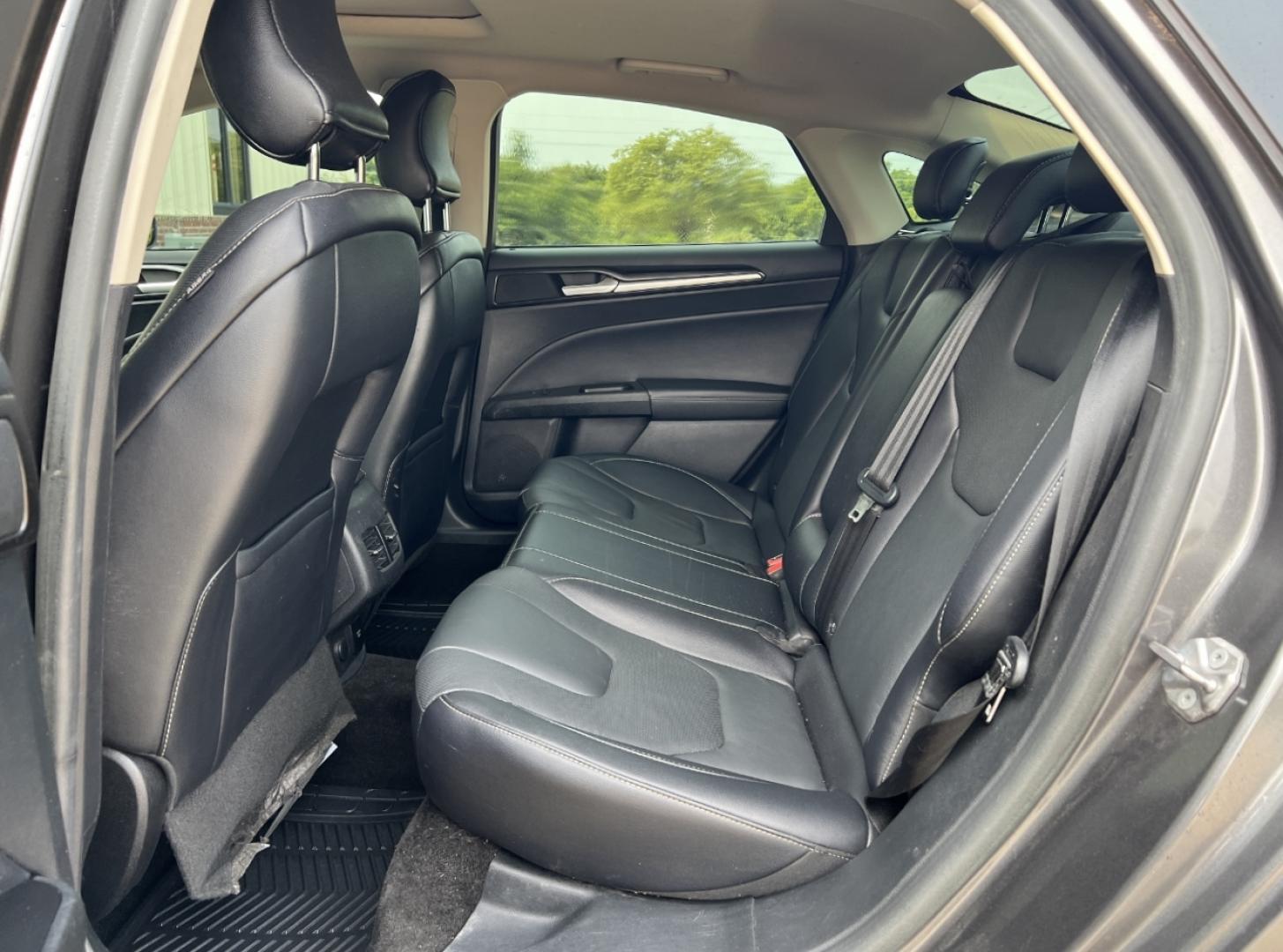 2018 GRAY /Black Leather Ford Fusion Titanium (3FA6P0K94JR) with an 2.0L 4 Cyl. engine, Automatic transmission, located at 2990 Old Orchard Rd., Jackson, MO, 63755, 37.354214, -89.612106 - 2018 Ford Fusion Titanium Local 1-Owner 83xxx miles Front Wheel Drive 2.0L 4 Cyl. Automatic Leather Navigation Backup Camera Power/Heated Seats Sunroof Bluetooth Remote Start Cruise Power Windows/Locks/Mirrors We have financing available and we accept trades! Fill out a credit applica - Photo#19