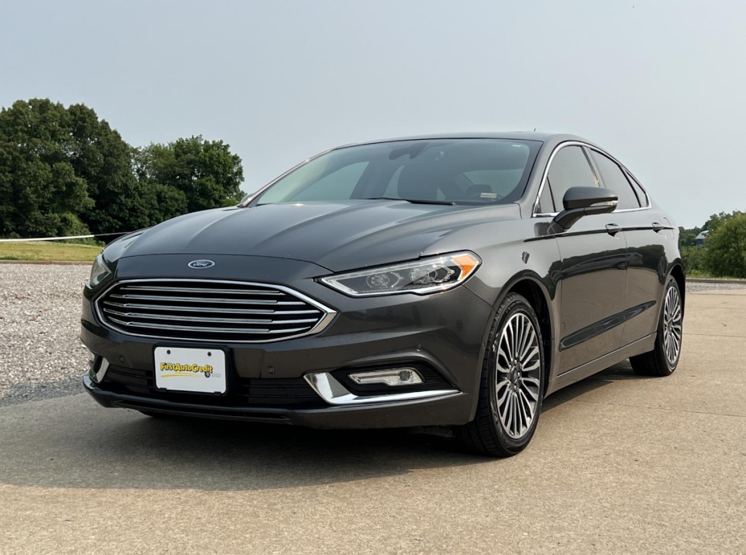 2018 GRAY /Black Leather Ford Fusion Titanium (3FA6P0K94JR) with an 2.0L 4 Cyl. engine, Automatic transmission, located at 2990 Old Orchard Rd., Jackson, MO, 63755, 37.354214, -89.612106 - 2018 Ford Fusion Titanium Local 1-Owner 83xxx miles Front Wheel Drive 2.0L 4 Cyl. Automatic Leather Navigation Backup Camera Power/Heated Seats Sunroof Bluetooth Remote Start Cruise Power Windows/Locks/Mirrors We have financing available and we accept trades! Fill out a credit applica - Photo#8