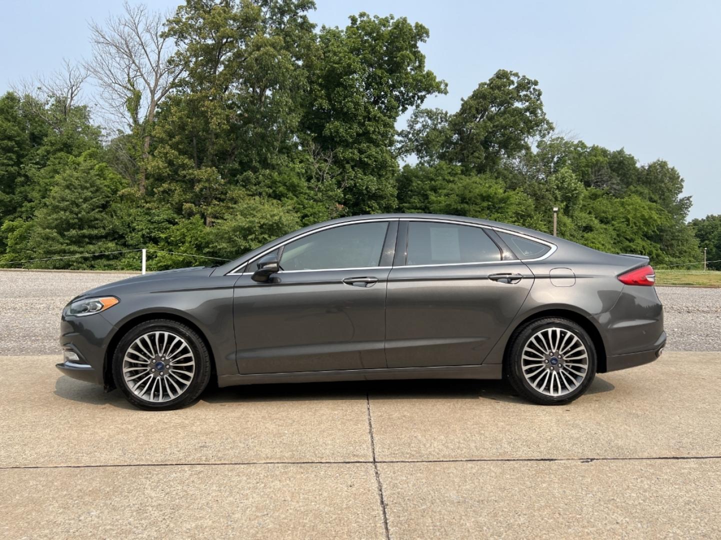 2018 GRAY /Black Leather Ford Fusion Titanium (3FA6P0K94JR) with an 2.0L 4 Cyl. engine, Automatic transmission, located at 2990 Old Orchard Rd., Jackson, MO, 63755, 37.354214, -89.612106 - 2018 Ford Fusion Titanium Local 1-Owner 83xxx miles Front Wheel Drive 2.0L 4 Cyl. Automatic Leather Navigation Backup Camera Power/Heated Seats Sunroof Bluetooth Remote Start Cruise Power Windows/Locks/Mirrors We have financing available and we accept trades! Fill out a credit applica - Photo#9