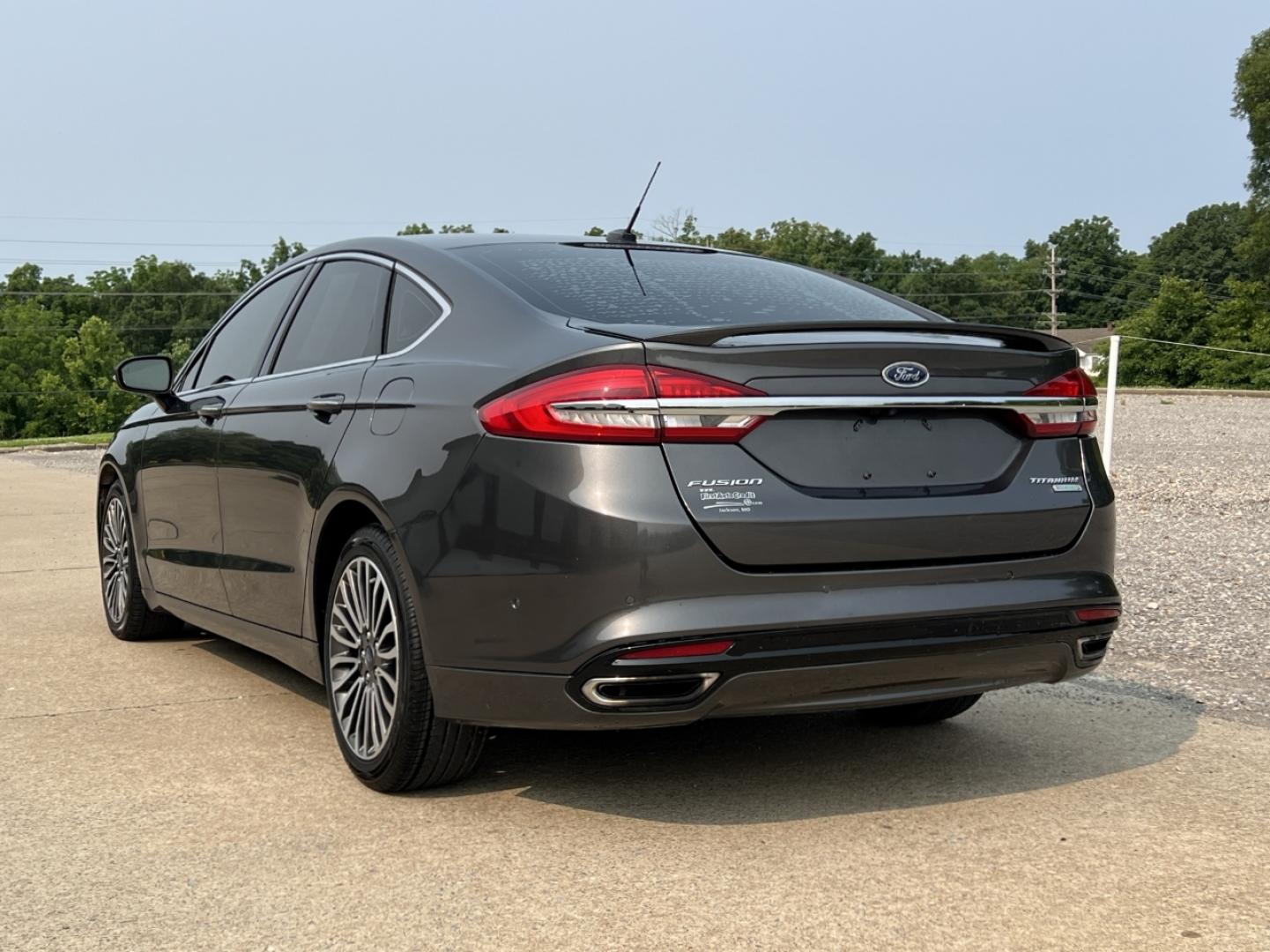 2018 GRAY /Black Leather Ford Fusion Titanium (3FA6P0K94JR) with an 2.0L 4 Cyl. engine, Automatic transmission, located at 2990 Old Orchard Rd., Jackson, MO, 63755, 37.354214, -89.612106 - 2018 Ford Fusion Titanium Local 1-Owner 83xxx miles Front Wheel Drive 2.0L 4 Cyl. Automatic Leather Navigation Backup Camera Power/Heated Seats Sunroof Bluetooth Remote Start Cruise Power Windows/Locks/Mirrors We have financing available and we accept trades! Fill out a credit applica - Photo#12