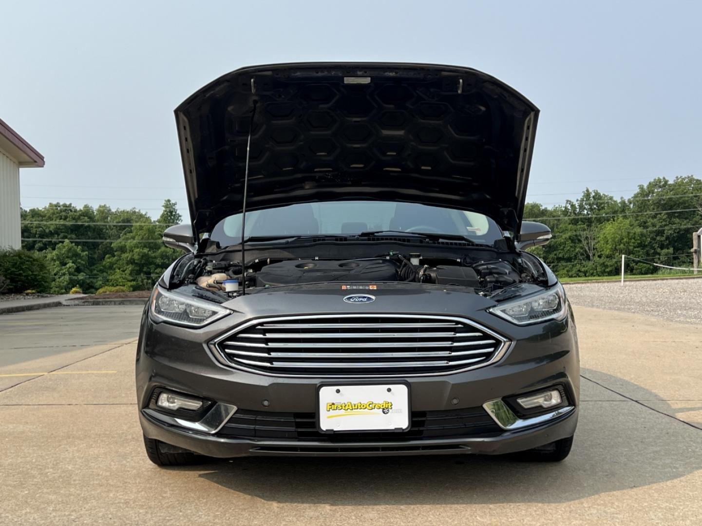 2018 GRAY /Black Leather Ford Fusion Titanium (3FA6P0K94JR) with an 2.0L 4 Cyl. engine, Automatic transmission, located at 2990 Old Orchard Rd., Jackson, MO, 63755, 37.354214, -89.612106 - 2018 Ford Fusion Titanium Local 1-Owner 83xxx miles Front Wheel Drive 2.0L 4 Cyl. Automatic Leather Navigation Backup Camera Power/Heated Seats Sunroof Bluetooth Remote Start Cruise Power Windows/Locks/Mirrors We have financing available and we accept trades! Fill out a credit applica - Photo#35