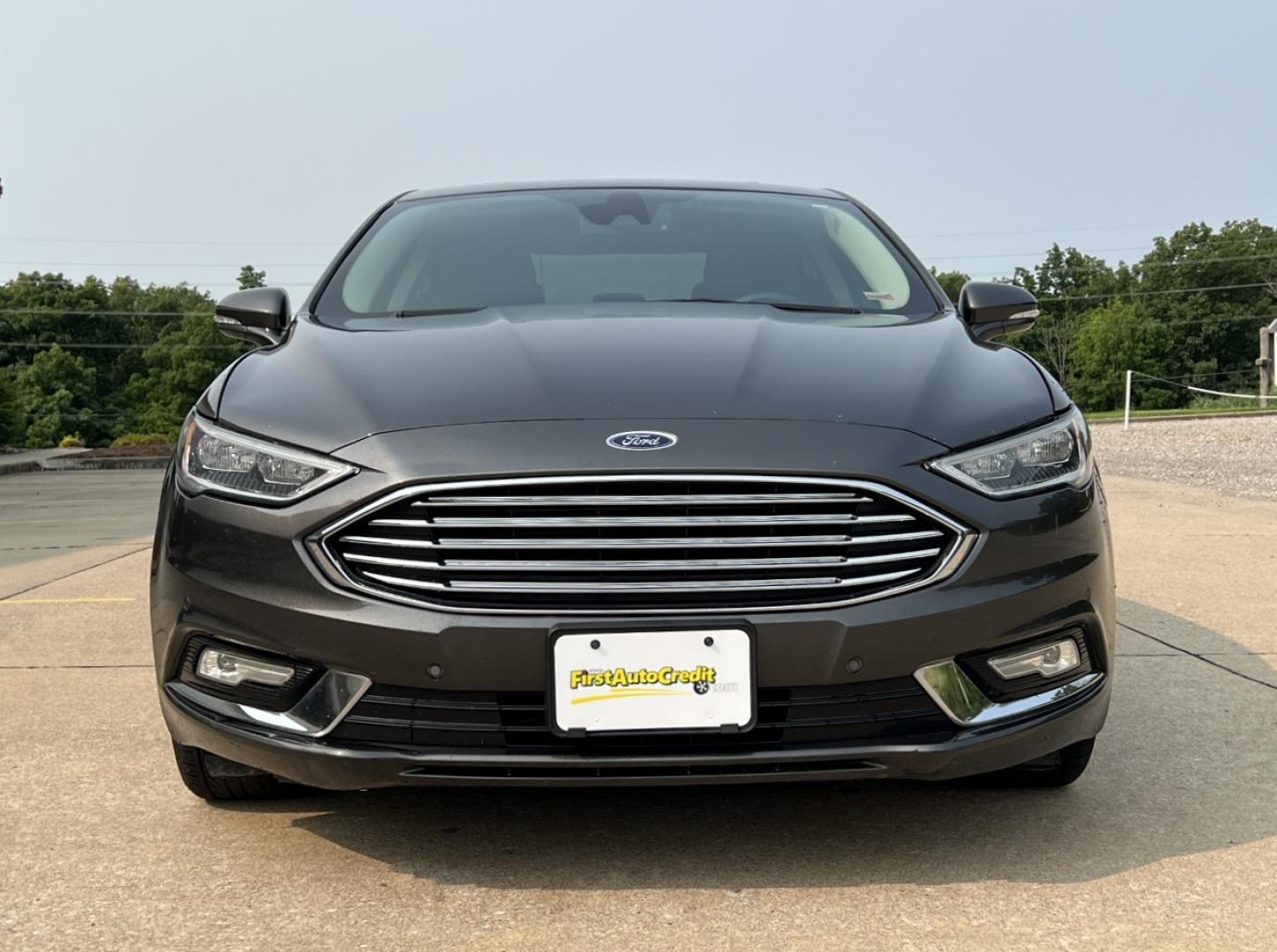 2018 GRAY /Black Leather Ford Fusion Titanium (3FA6P0K94JR) with an 2.0L 4 Cyl. engine, Automatic transmission, located at 2990 Old Orchard Rd., Jackson, MO, 63755, 37.354214, -89.612106 - 2018 Ford Fusion Titanium Local 1-Owner 83xxx miles Front Wheel Drive 2.0L 4 Cyl. Automatic Leather Navigation Backup Camera Power/Heated Seats Sunroof Bluetooth Remote Start Cruise Power Windows/Locks/Mirrors We have financing available and we accept trades! Fill out a credit applica - Photo#14