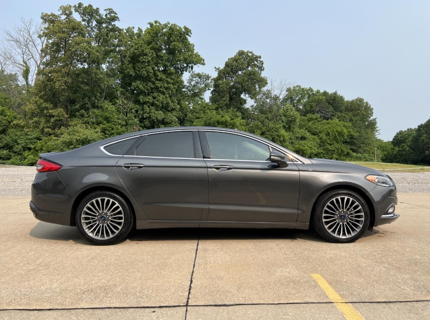 2018 GRAY /Black Leather Ford Fusion Titanium (3FA6P0K94JR) with an 2.0L 4 Cyl. engine, Automatic transmission, located at 2990 Old Orchard Rd., Jackson, MO, 63755, 37.354214, -89.612106 - 2018 Ford Fusion Titanium Local 1-Owner 83xxx miles Front Wheel Drive 2.0L 4 Cyl. Automatic Leather Navigation Backup Camera Power/Heated Seats Sunroof Bluetooth Remote Start Cruise Power Windows/Locks/Mirrors We have financing available and we accept trades! Fill out a credit applica - Photo#10