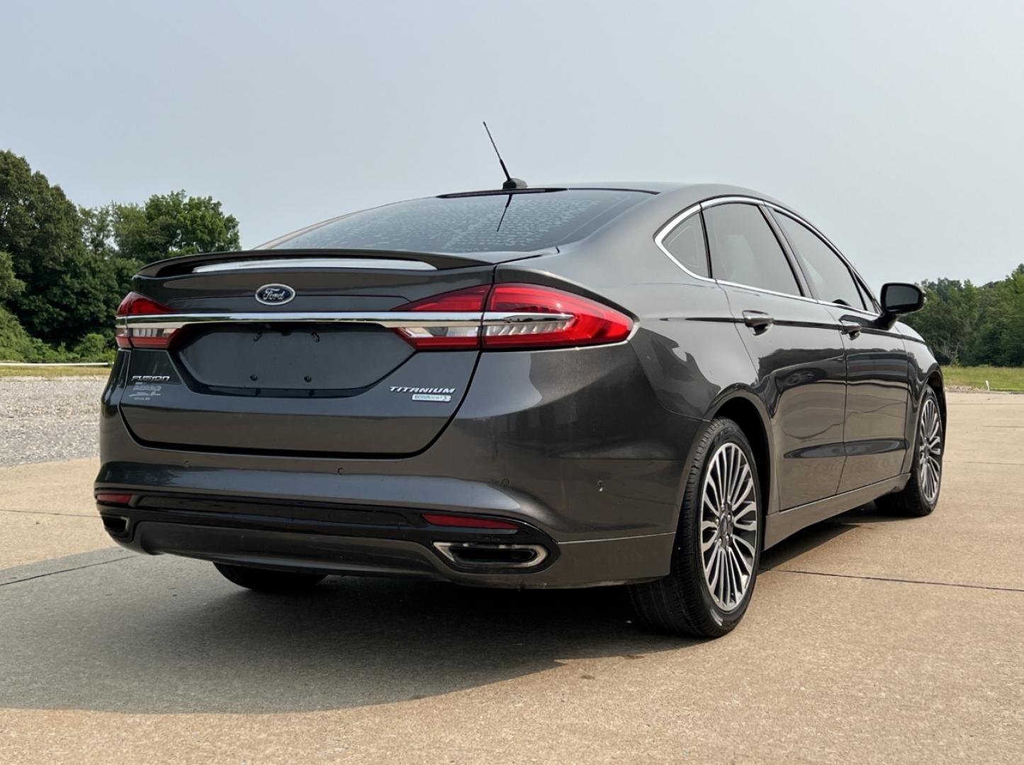 2018 GRAY /Black Leather Ford Fusion Titanium (3FA6P0K94JR) with an 2.0L 4 Cyl. engine, Automatic transmission, located at 2990 Old Orchard Rd., Jackson, MO, 63755, 37.354214, -89.612106 - 2018 Ford Fusion Titanium Local 1-Owner 83xxx miles Front Wheel Drive 2.0L 4 Cyl. Automatic Leather Navigation Backup Camera Power/Heated Seats Sunroof Bluetooth Remote Start Cruise Power Windows/Locks/Mirrors We have financing available and we accept trades! Fill out a credit applica - Photo#11
