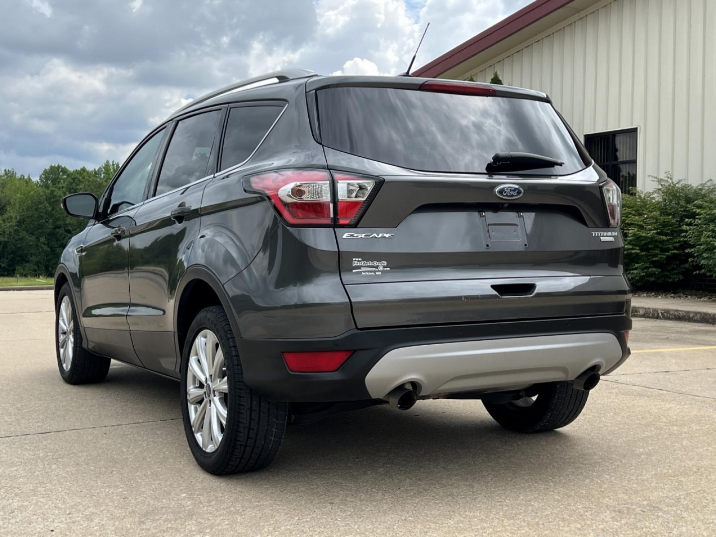 2017 GRAY /Tan Leather Ford Escape Titanium FWD (1FMCU0JD0HU) with an 1.5L 4 Cyl. engine, Automatic transmission, located at 2990 Old Orchard Rd., Jackson, MO, 63755, 37.354214, -89.612106 - 2017 Ford Escape Titanium Only 73xxx miles Front Wheel Drive 1.5L 4 Cyl. Automatic Leather Navigation Power/Heated Seats Backup Camera Bluetooth Remote Start Cruise Power Windows/Locks/Mirrors We have financing available and we accept trades! Fill out a credit application on our website - Photo#11