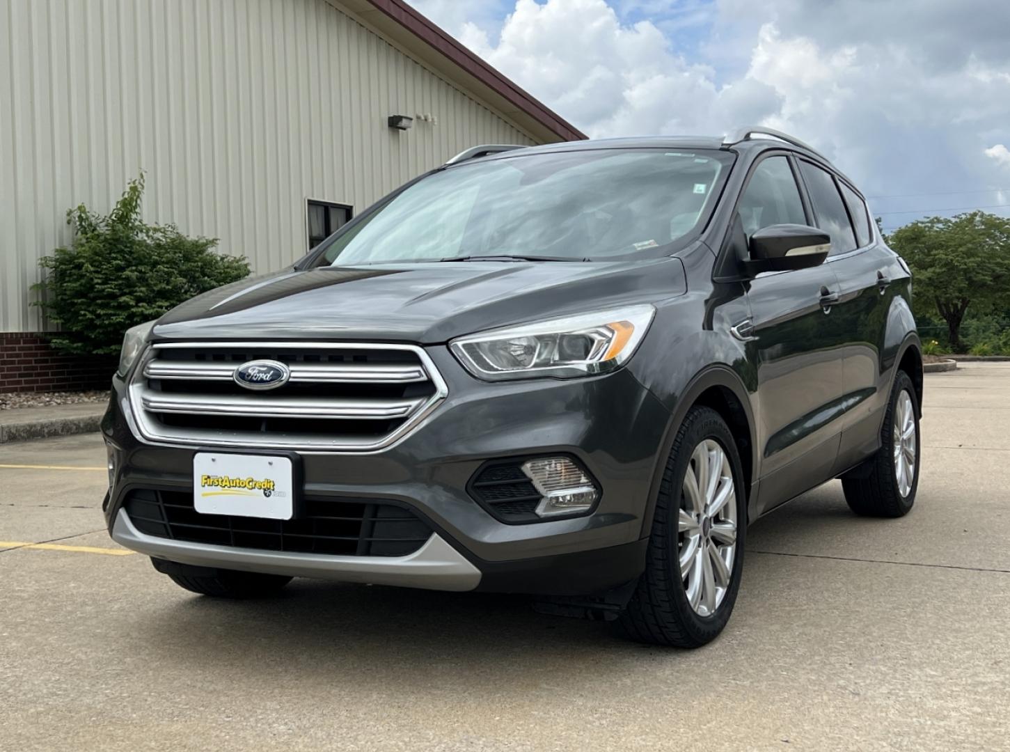 2017 GRAY /Tan Leather Ford Escape Titanium FWD (1FMCU0JD0HU) with an 1.5L 4 Cyl. engine, Automatic transmission, located at 2990 Old Orchard Rd., Jackson, MO, 63755, 37.354214, -89.612106 - 2017 Ford Escape Titanium Only 73xxx miles Front Wheel Drive 1.5L 4 Cyl. Automatic Leather Navigation Power/Heated Seats Backup Camera Bluetooth Remote Start Cruise Power Windows/Locks/Mirrors We have financing available and we accept trades! Fill out a credit application on our website - Photo#7