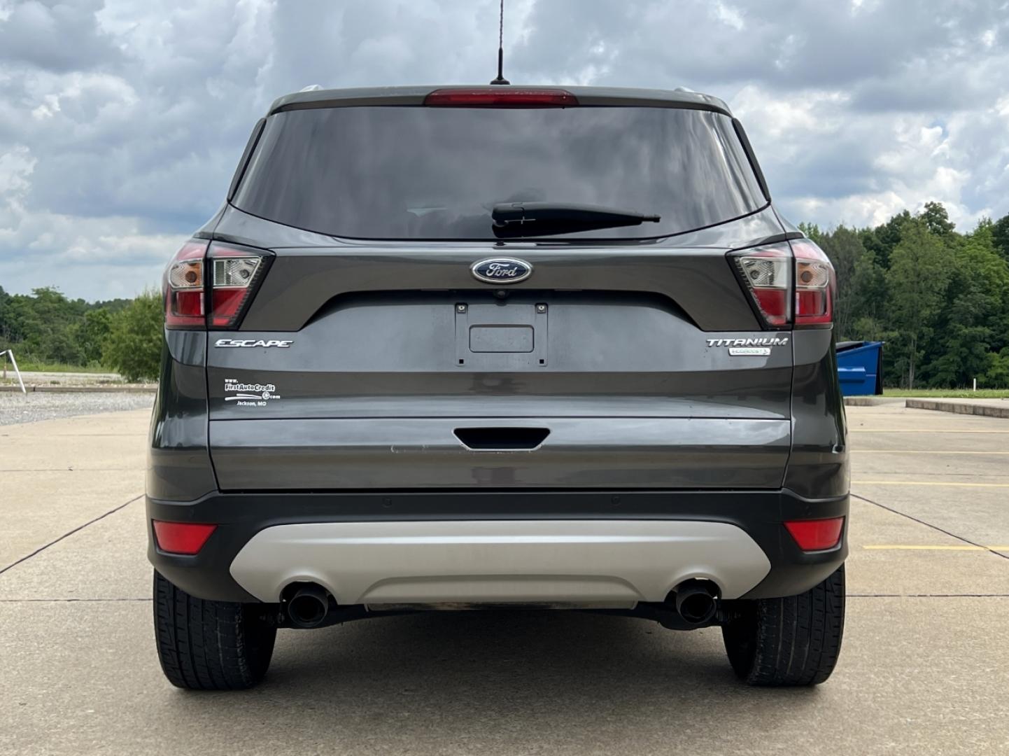 2017 GRAY /Tan Leather Ford Escape Titanium FWD (1FMCU0JD0HU) with an 1.5L 4 Cyl. engine, Automatic transmission, located at 2990 Old Orchard Rd., Jackson, MO, 63755, 37.354214, -89.612106 - 2017 Ford Escape Titanium Only 73xxx miles Front Wheel Drive 1.5L 4 Cyl. Automatic Leather Navigation Power/Heated Seats Backup Camera Bluetooth Remote Start Cruise Power Windows/Locks/Mirrors We have financing available and we accept trades! Fill out a credit application on our website - Photo#12