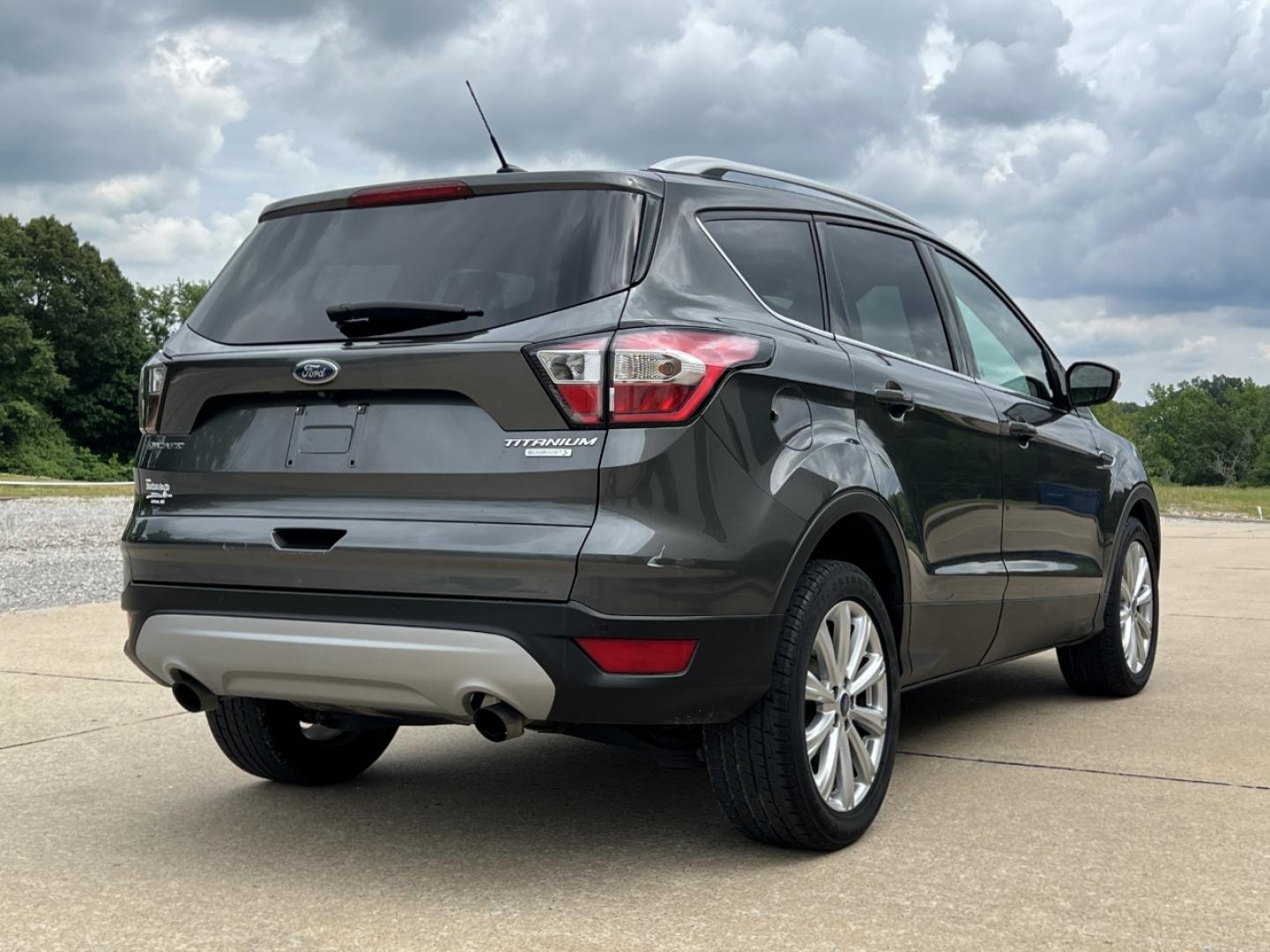 2017 GRAY /Tan Leather Ford Escape Titanium FWD (1FMCU0JD0HU) with an 1.5L 4 Cyl. engine, Automatic transmission, located at 2990 Old Orchard Rd., Jackson, MO, 63755, 37.354214, -89.612106 - 2017 Ford Escape Titanium Only 73xxx miles Front Wheel Drive 1.5L 4 Cyl. Automatic Leather Navigation Power/Heated Seats Backup Camera Bluetooth Remote Start Cruise Power Windows/Locks/Mirrors We have financing available and we accept trades! Fill out a credit application on our website - Photo#10