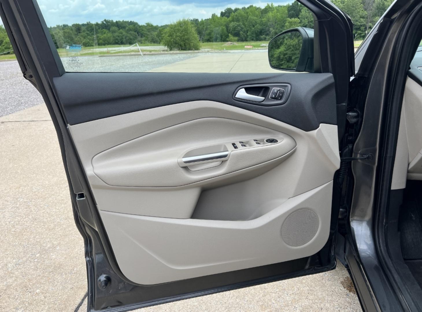 2017 GRAY /Tan Leather Ford Escape Titanium FWD (1FMCU0JD0HU) with an 1.5L 4 Cyl. engine, Automatic transmission, located at 2990 Old Orchard Rd., Jackson, MO, 63755, 37.354214, -89.612106 - 2017 Ford Escape Titanium Only 73xxx miles Front Wheel Drive 1.5L 4 Cyl. Automatic Leather Navigation Power/Heated Seats Backup Camera Bluetooth Remote Start Cruise Power Windows/Locks/Mirrors We have financing available and we accept trades! Fill out a credit application on our website - Photo#14