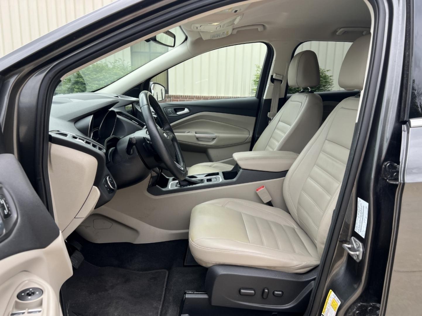 2017 GRAY /Tan Leather Ford Escape Titanium FWD (1FMCU0JD0HU) with an 1.5L 4 Cyl. engine, Automatic transmission, located at 2990 Old Orchard Rd., Jackson, MO, 63755, 37.354214, -89.612106 - 2017 Ford Escape Titanium Only 73xxx miles Front Wheel Drive 1.5L 4 Cyl. Automatic Leather Navigation Power/Heated Seats Backup Camera Bluetooth Remote Start Cruise Power Windows/Locks/Mirrors We have financing available and we accept trades! Fill out a credit application on our website - Photo#15