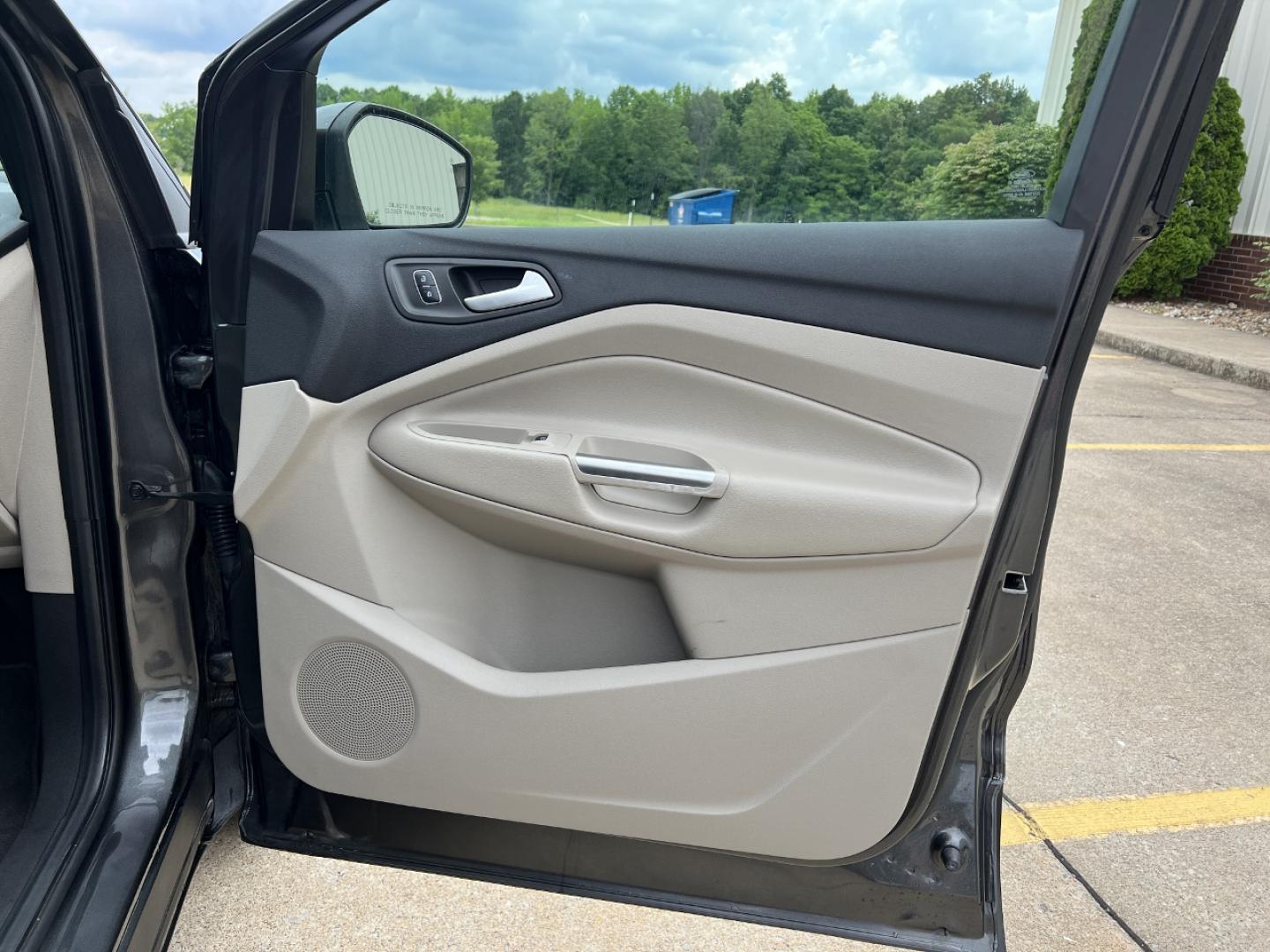 2017 GRAY /Tan Leather Ford Escape Titanium FWD (1FMCU0JD0HU) with an 1.5L 4 Cyl. engine, Automatic transmission, located at 2990 Old Orchard Rd., Jackson, MO, 63755, 37.354214, -89.612106 - 2017 Ford Escape Titanium Only 73xxx miles Front Wheel Drive 1.5L 4 Cyl. Automatic Leather Navigation Power/Heated Seats Backup Camera Bluetooth Remote Start Cruise Power Windows/Locks/Mirrors We have financing available and we accept trades! Fill out a credit application on our website - Photo#16