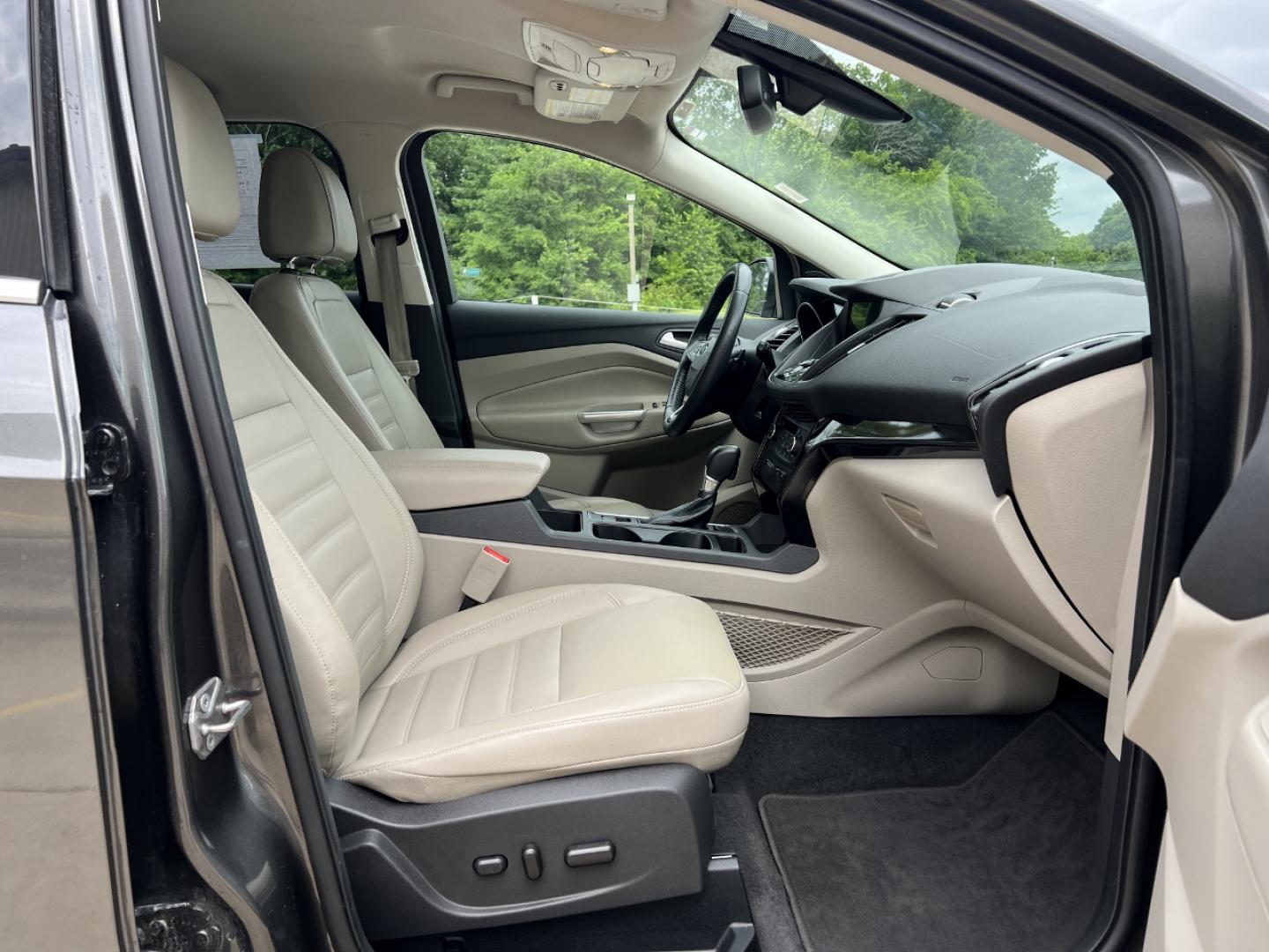 2017 GRAY /Tan Leather Ford Escape Titanium FWD (1FMCU0JD0HU) with an 1.5L 4 Cyl. engine, Automatic transmission, located at 2990 Old Orchard Rd., Jackson, MO, 63755, 37.354214, -89.612106 - 2017 Ford Escape Titanium Only 73xxx miles Front Wheel Drive 1.5L 4 Cyl. Automatic Leather Navigation Power/Heated Seats Backup Camera Bluetooth Remote Start Cruise Power Windows/Locks/Mirrors We have financing available and we accept trades! Fill out a credit application on our website - Photo#17
