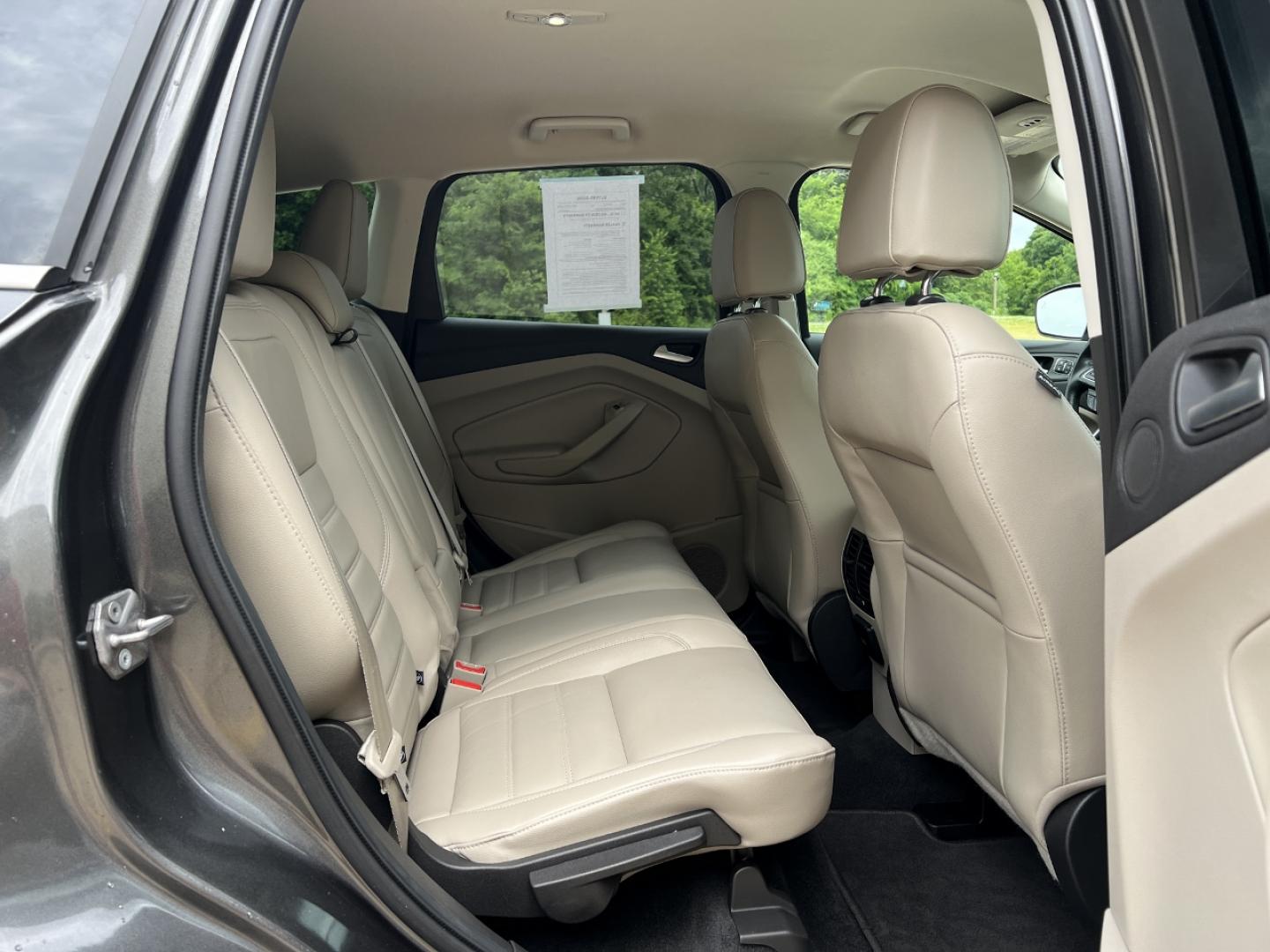 2017 GRAY /Tan Leather Ford Escape Titanium FWD (1FMCU0JD0HU) with an 1.5L 4 Cyl. engine, Automatic transmission, located at 2990 Old Orchard Rd., Jackson, MO, 63755, 37.354214, -89.612106 - 2017 Ford Escape Titanium Only 73xxx miles Front Wheel Drive 1.5L 4 Cyl. Automatic Leather Navigation Power/Heated Seats Backup Camera Bluetooth Remote Start Cruise Power Windows/Locks/Mirrors We have financing available and we accept trades! Fill out a credit application on our website - Photo#19