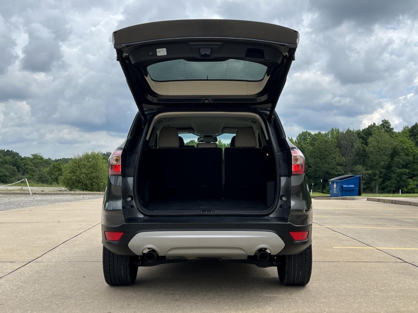 2017 GRAY /Tan Leather Ford Escape Titanium FWD (1FMCU0JD0HU) with an 1.5L 4 Cyl. engine, Automatic transmission, located at 2990 Old Orchard Rd., Jackson, MO, 63755, 37.354214, -89.612106 - 2017 Ford Escape Titanium Only 73xxx miles Front Wheel Drive 1.5L 4 Cyl. Automatic Leather Navigation Power/Heated Seats Backup Camera Bluetooth Remote Start Cruise Power Windows/Locks/Mirrors We have financing available and we accept trades! Fill out a credit application on our website - Photo#20