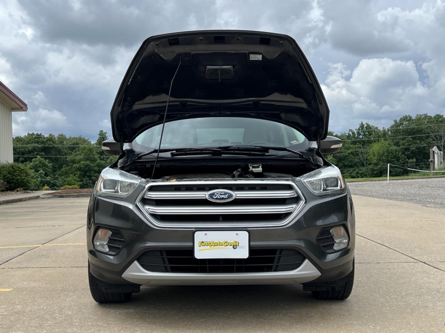2017 GRAY /Tan Leather Ford Escape Titanium FWD (1FMCU0JD0HU) with an 1.5L 4 Cyl. engine, Automatic transmission, located at 2990 Old Orchard Rd., Jackson, MO, 63755, 37.354214, -89.612106 - 2017 Ford Escape Titanium Only 73xxx miles Front Wheel Drive 1.5L 4 Cyl. Automatic Leather Navigation Power/Heated Seats Backup Camera Bluetooth Remote Start Cruise Power Windows/Locks/Mirrors We have financing available and we accept trades! Fill out a credit application on our website - Photo#36