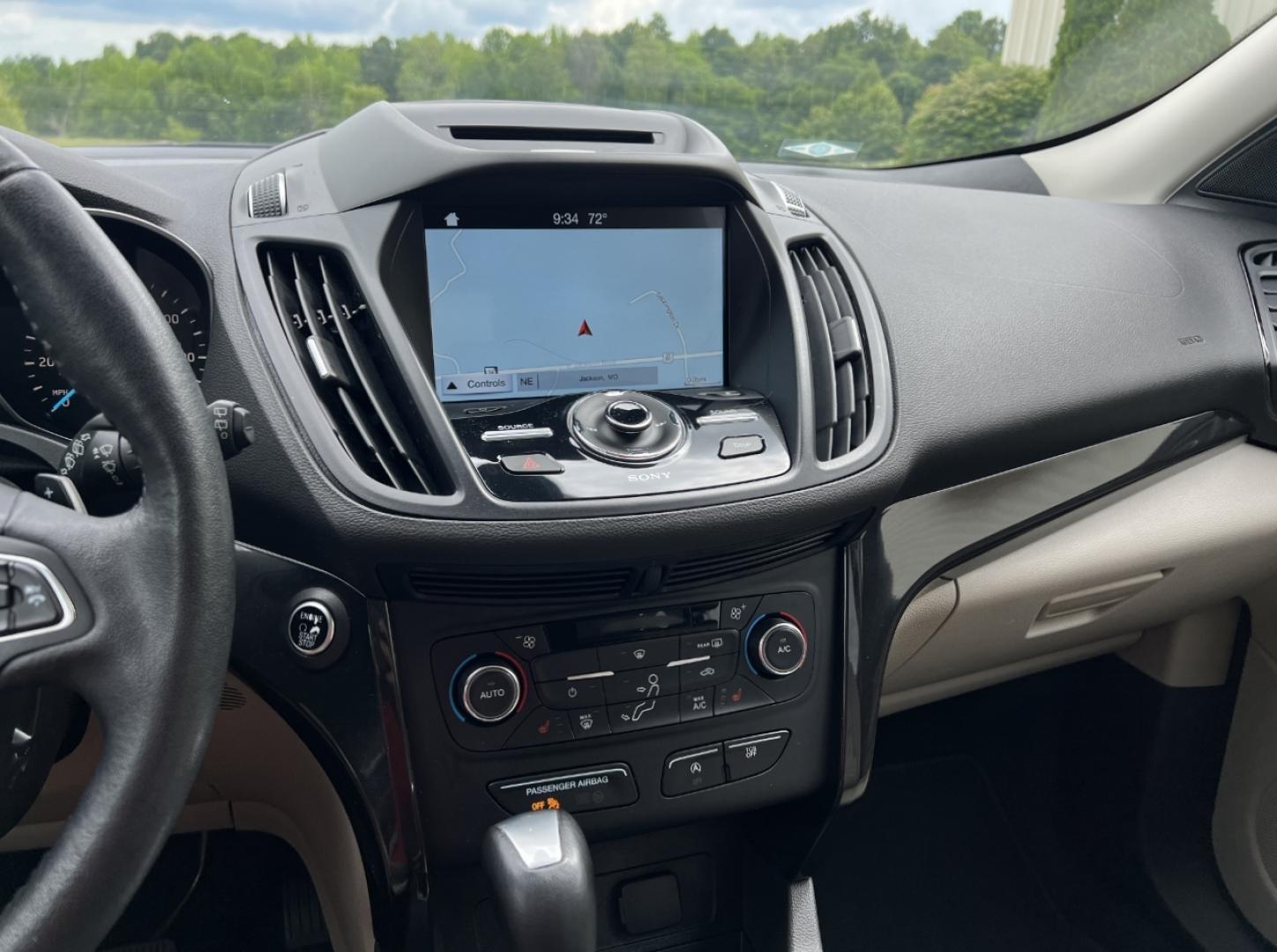 2017 GRAY /Tan Leather Ford Escape Titanium FWD (1FMCU0JD0HU) with an 1.5L 4 Cyl. engine, Automatic transmission, located at 2990 Old Orchard Rd., Jackson, MO, 63755, 37.354214, -89.612106 - 2017 Ford Escape Titanium Only 73xxx miles Front Wheel Drive 1.5L 4 Cyl. Automatic Leather Navigation Power/Heated Seats Backup Camera Bluetooth Remote Start Cruise Power Windows/Locks/Mirrors We have financing available and we accept trades! Fill out a credit application on our website - Photo#27