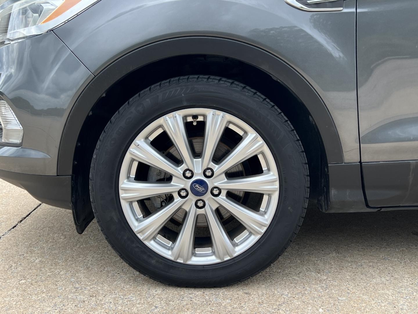 2017 GRAY /Tan Leather Ford Escape Titanium FWD (1FMCU0JD0HU) with an 1.5L 4 Cyl. engine, Automatic transmission, located at 2990 Old Orchard Rd., Jackson, MO, 63755, 37.354214, -89.612106 - 2017 Ford Escape Titanium Only 73xxx miles Front Wheel Drive 1.5L 4 Cyl. Automatic Leather Navigation Power/Heated Seats Backup Camera Bluetooth Remote Start Cruise Power Windows/Locks/Mirrors We have financing available and we accept trades! Fill out a credit application on our website - Photo#38