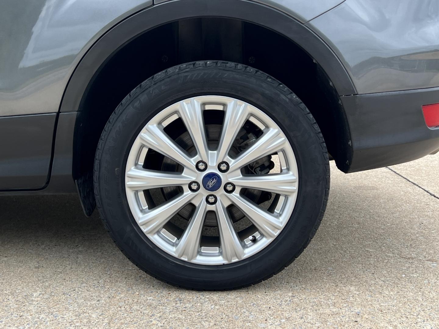 2017 GRAY /Tan Leather Ford Escape Titanium FWD (1FMCU0JD0HU) with an 1.5L 4 Cyl. engine, Automatic transmission, located at 2990 Old Orchard Rd., Jackson, MO, 63755, 37.354214, -89.612106 - 2017 Ford Escape Titanium Only 73xxx miles Front Wheel Drive 1.5L 4 Cyl. Automatic Leather Navigation Power/Heated Seats Backup Camera Bluetooth Remote Start Cruise Power Windows/Locks/Mirrors We have financing available and we accept trades! Fill out a credit application on our website - Photo#40