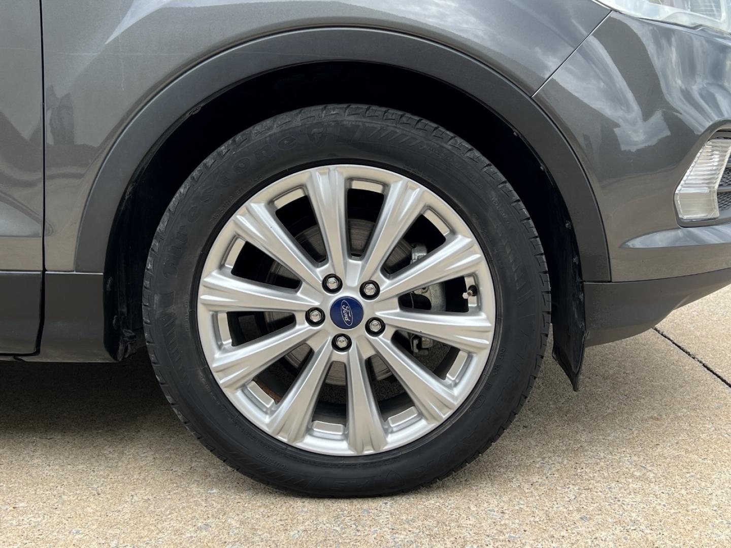 2017 GRAY /Tan Leather Ford Escape Titanium FWD (1FMCU0JD0HU) with an 1.5L 4 Cyl. engine, Automatic transmission, located at 2990 Old Orchard Rd., Jackson, MO, 63755, 37.354214, -89.612106 - 2017 Ford Escape Titanium Only 73xxx miles Front Wheel Drive 1.5L 4 Cyl. Automatic Leather Navigation Power/Heated Seats Backup Camera Bluetooth Remote Start Cruise Power Windows/Locks/Mirrors We have financing available and we accept trades! Fill out a credit application on our website - Photo#42
