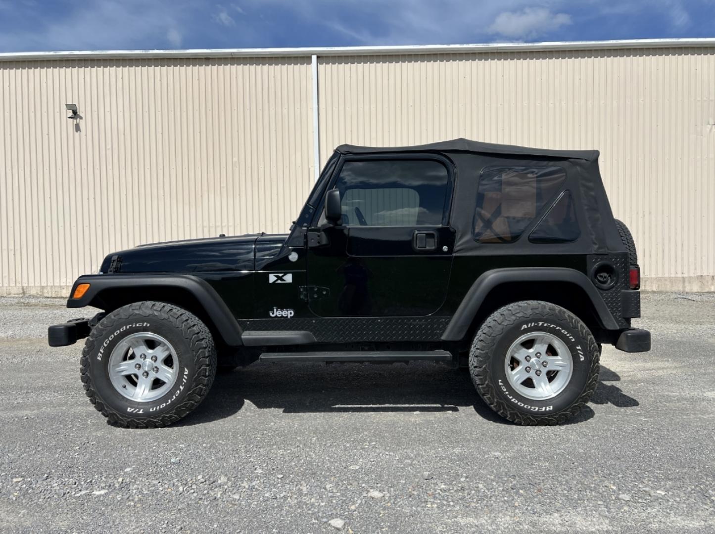 2004 BLACK /Black Cloth Jeep Wrangler X (1J4FA39S24P) with an 4.0L V6 engine, 5-Speed Manual transmission, located at 2990 Old Orchard Rd., Jackson, MO, 63755, 37.354214, -89.612106 - We have financing available and we accept trades! Fill out a credit application on our website or come by today! If you have any questions, give us a call at (573) 204-7777 or visit our website at firstautocredit.com. - Photo#5