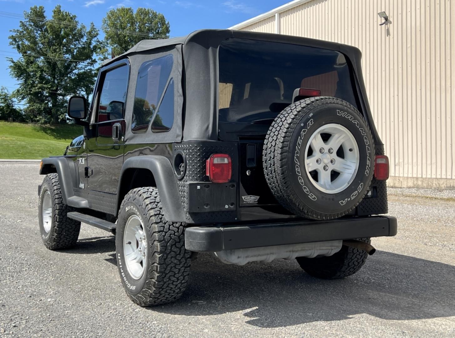 2004 BLACK /Black Cloth Jeep Wrangler X (1J4FA39S24P) with an 4.0L V6 engine, 5-Speed Manual transmission, located at 2990 Old Orchard Rd., Jackson, MO, 63755, 37.354214, -89.612106 - We have financing available and we accept trades! Fill out a credit application on our website or come by today! If you have any questions, give us a call at (573) 204-7777 or visit our website at firstautocredit.com. - Photo#6